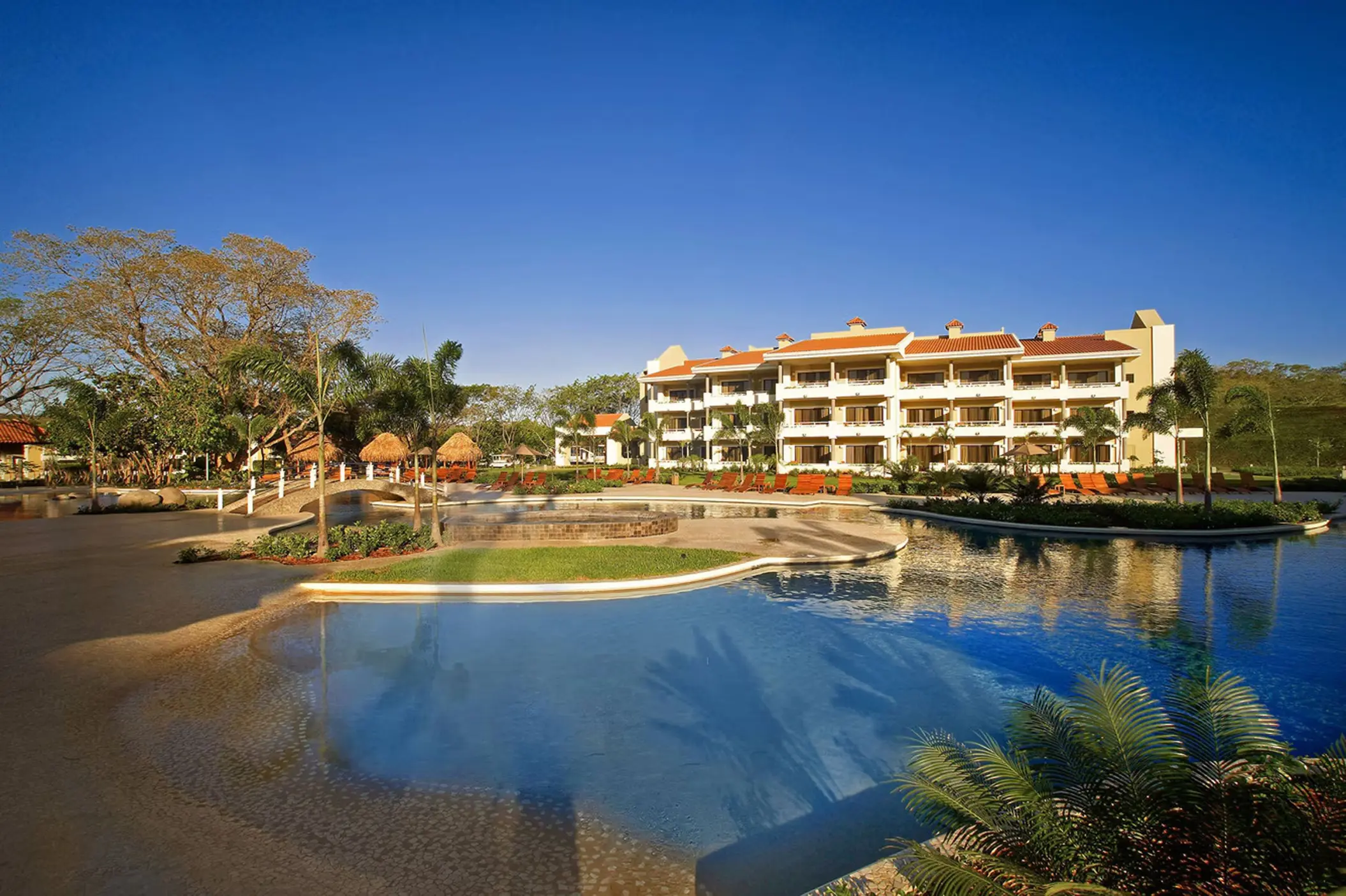 Lagoon-style swimming pool and resort buildings at Westin Reserva Conchal, Liberia