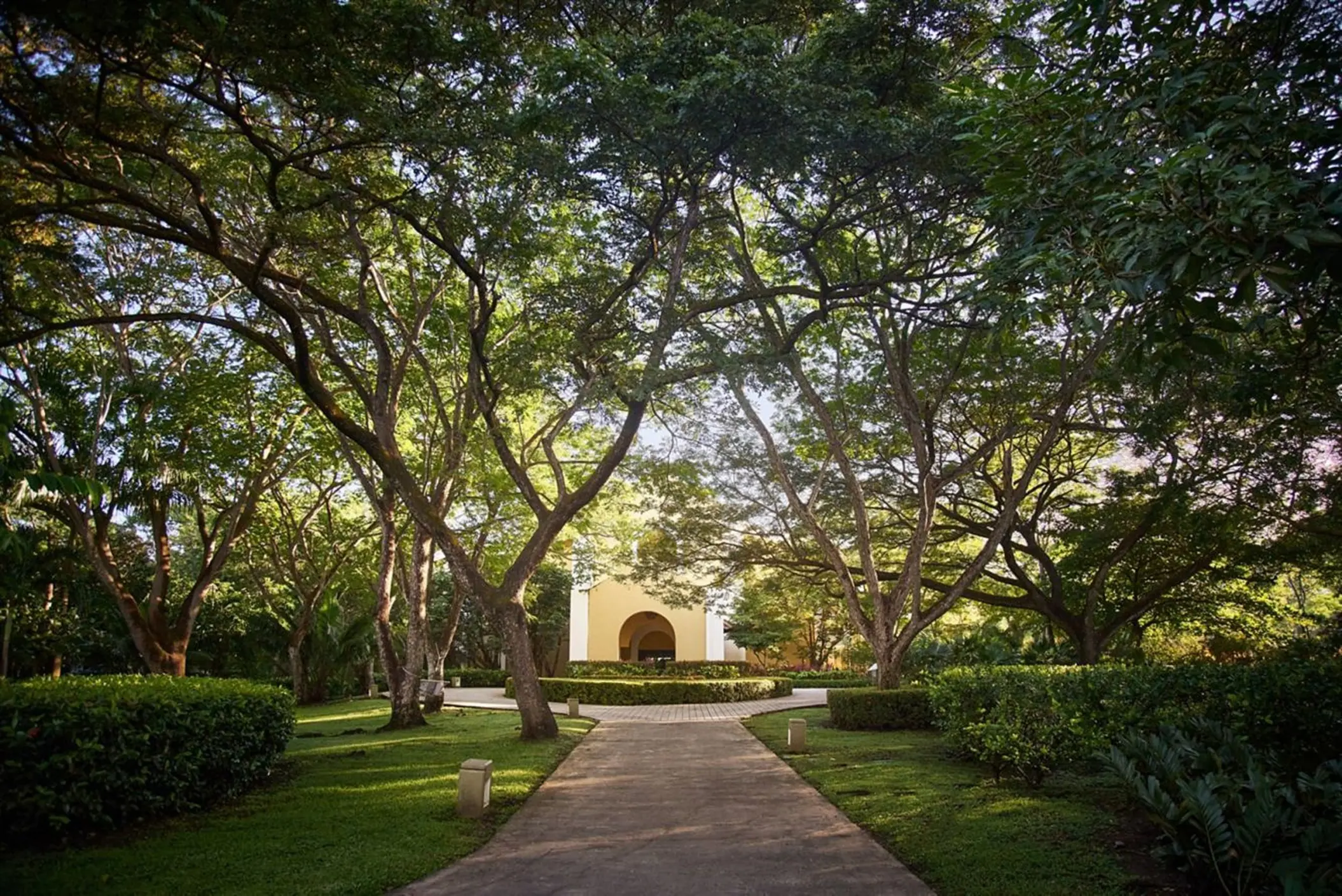 Lush tropical garden pathway and architecture at Westin Reserva Conchal, Liberia