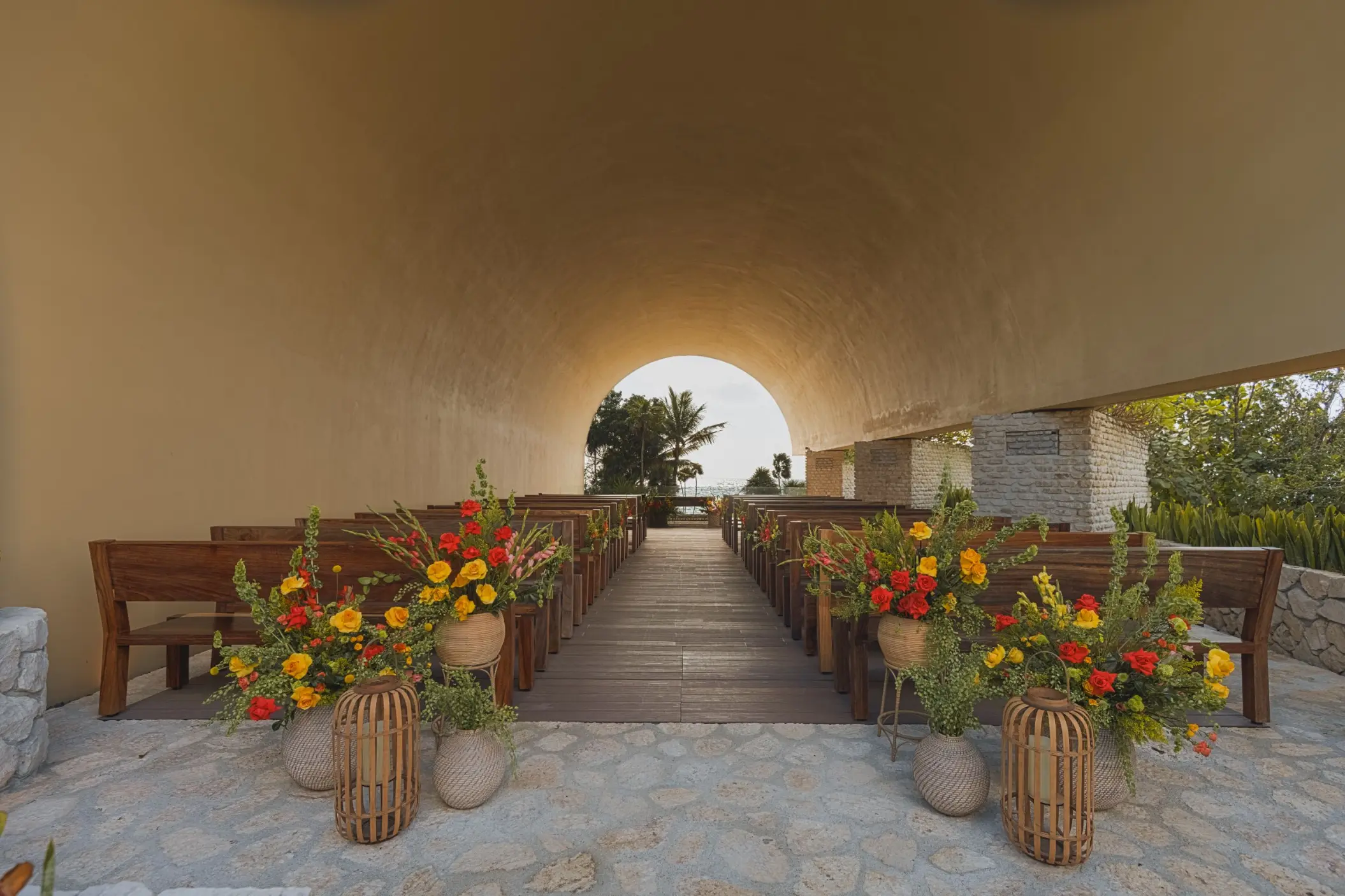 Ecumenical chapel wedding ceremony setup at Hotel Xcaret Arte, Riviera Maya