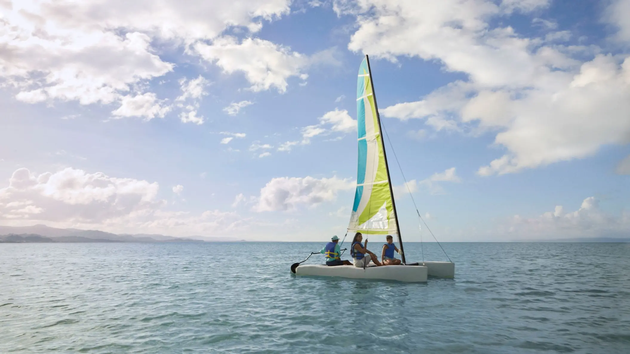 Catamaran sailing on turquoise water at Zemi Miches, Punta Cana