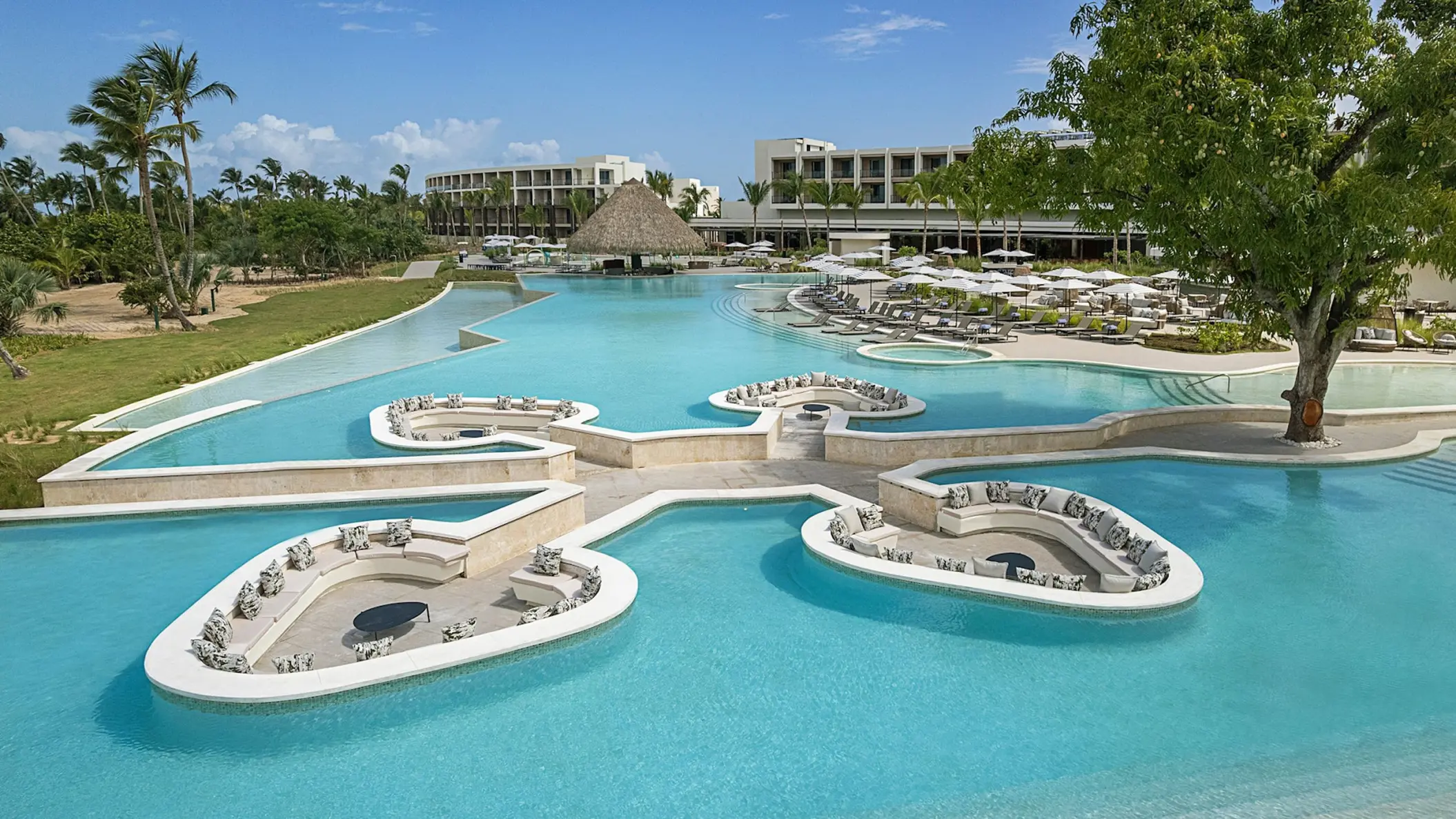 Zemi Miches main pool with sunken seating areas and swim-up bar, Punta Cana