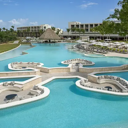 Zemi Miches main pool with sunken seating areas and swim-up bar, Punta Cana
