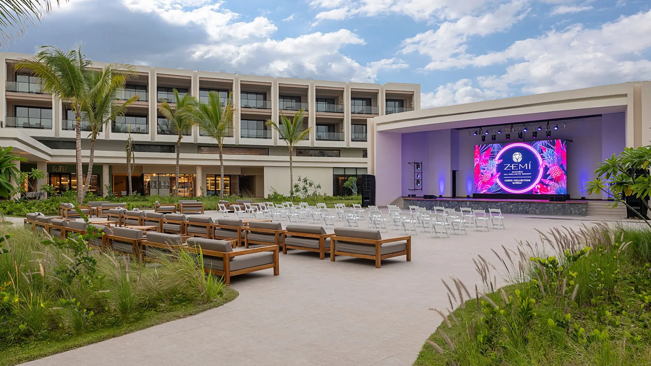 Amphitheater with outdoor seating and digital stage screen at Zemi Miches, Punta Cana