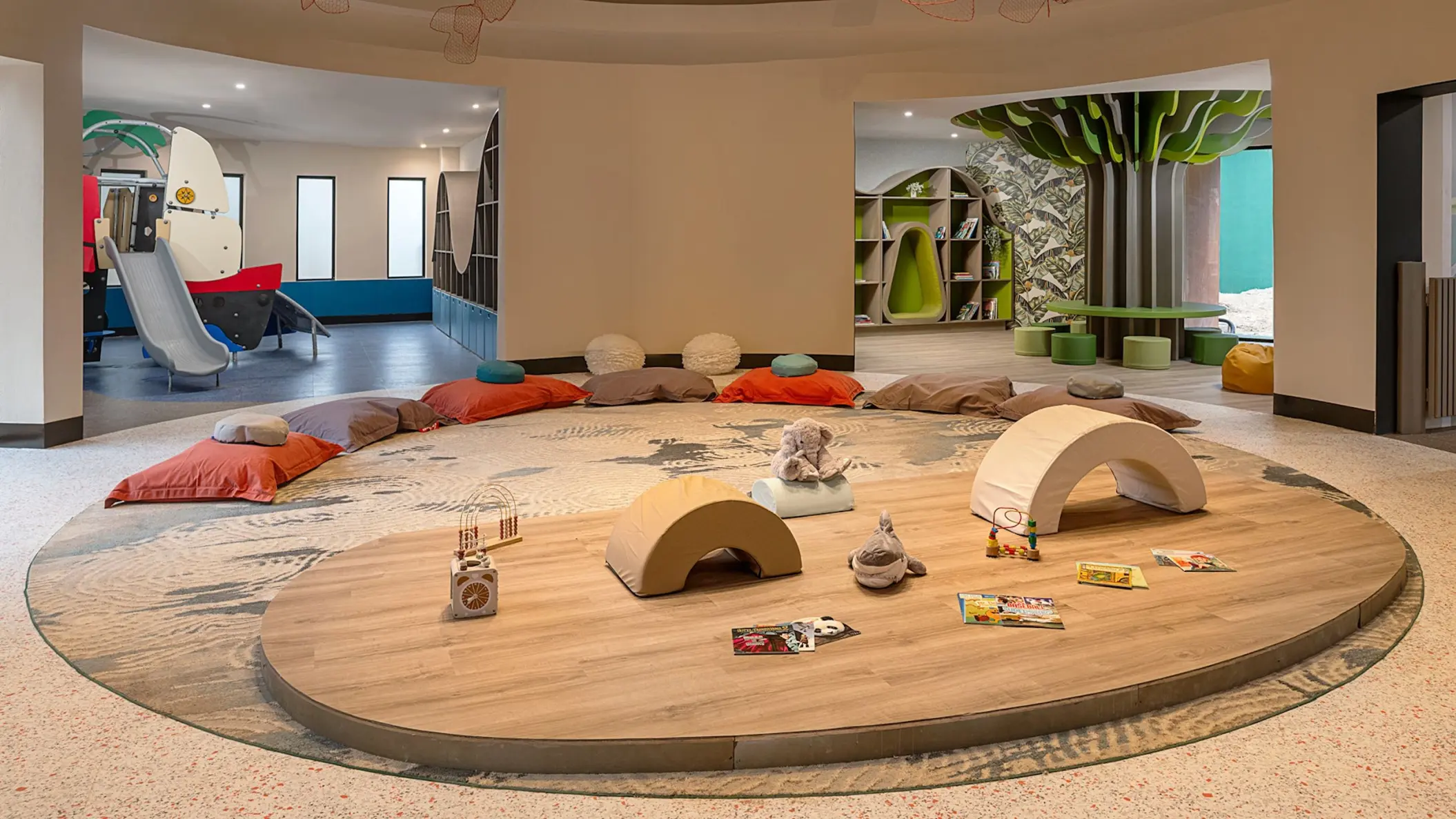 Coki Cove kids club with floor seating and indoor playground at Zemi Miches, Punta Cana