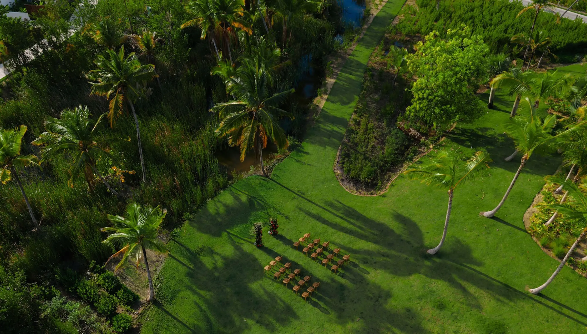 Aerial view of a garden wedding ceremony setup at Zemi Miches, Punta Cana