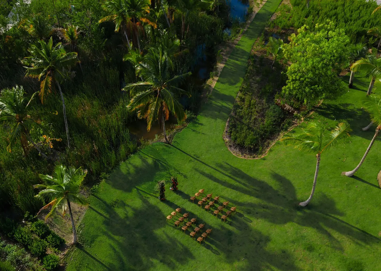 Aerial view of a garden wedding ceremony setup at Zemi Miches, Punta Cana