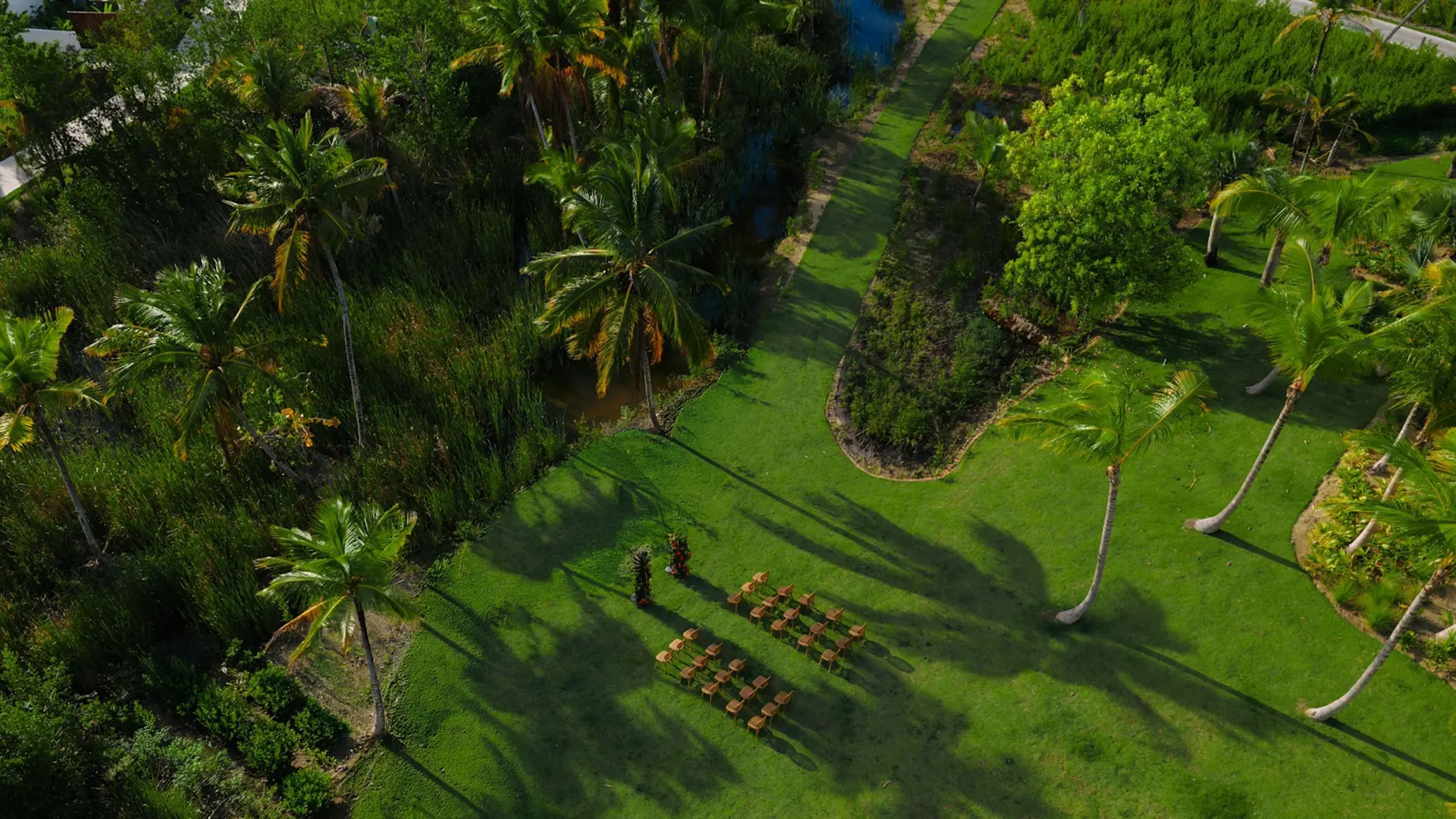 Aerial view of a garden wedding ceremony setup at Zemi Miches, Punta Cana