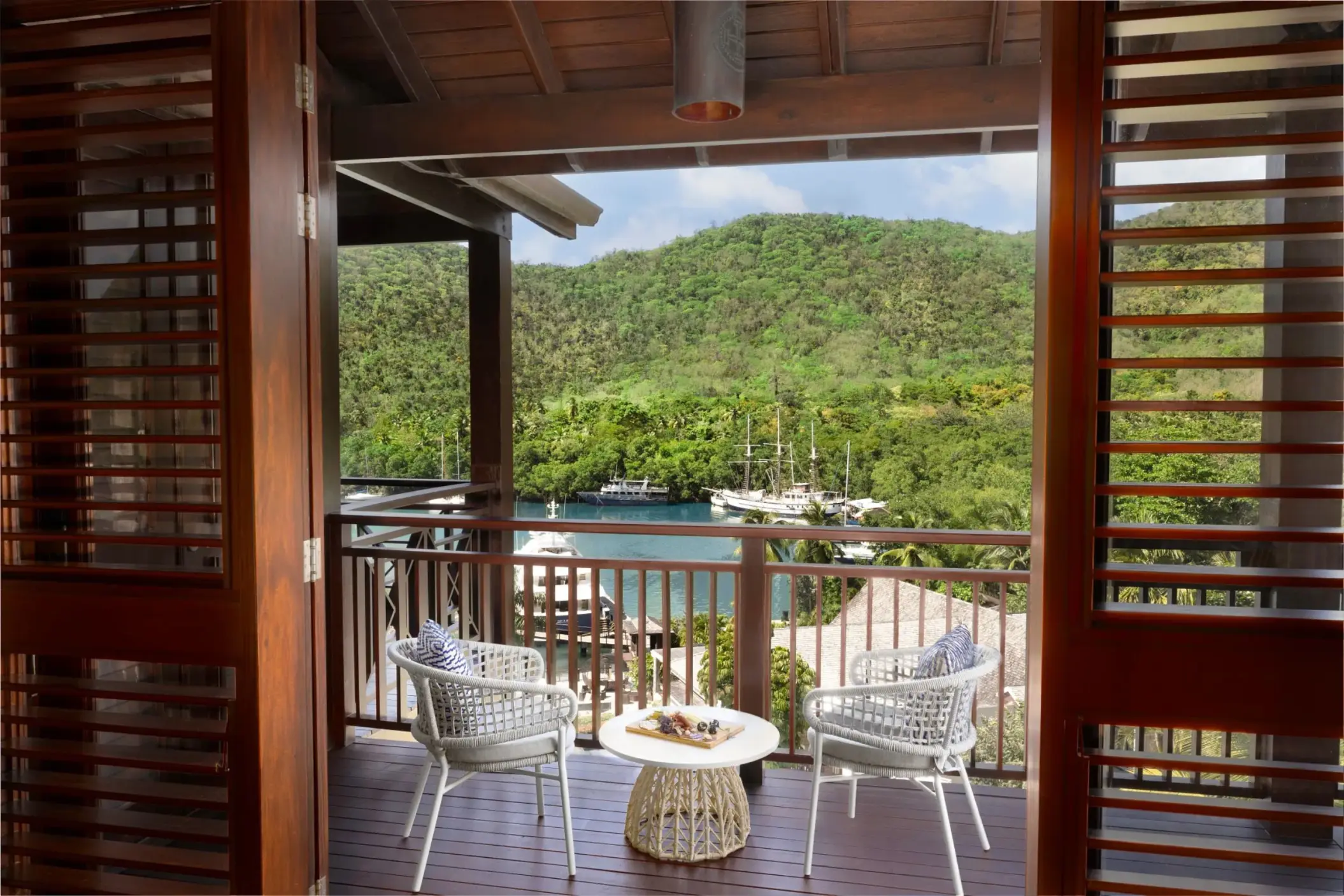 Junior Suite bay view balcony at Zoetry Marigot Bay, Castries
