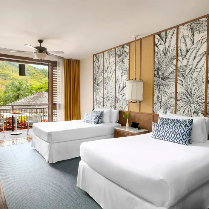 junior suite garden view double beds at Zoetry Marigot Bay St. Lucia