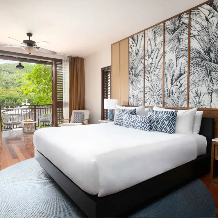 Junior suite with garden view and private balcony at Zoetry Marigot Bay, Castries