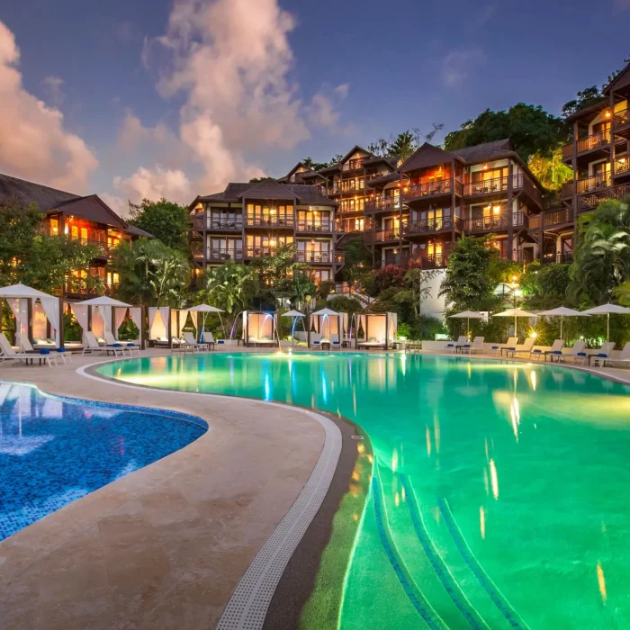main pool and the Zoetry Marigot Bay St. Lucia resort at night