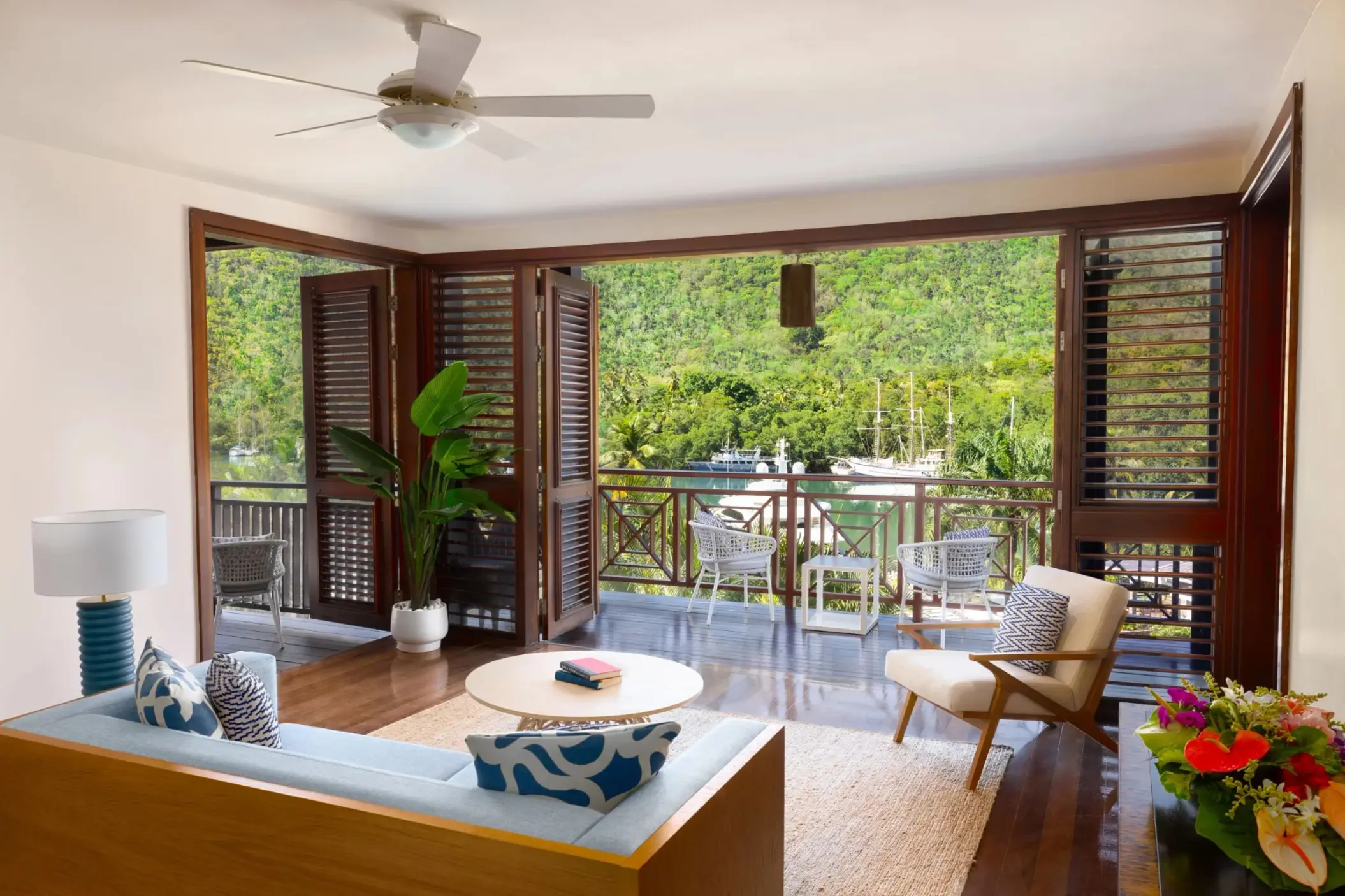 Master suite residence living room with private balcony at Zoetry Marigot Bay, Castries