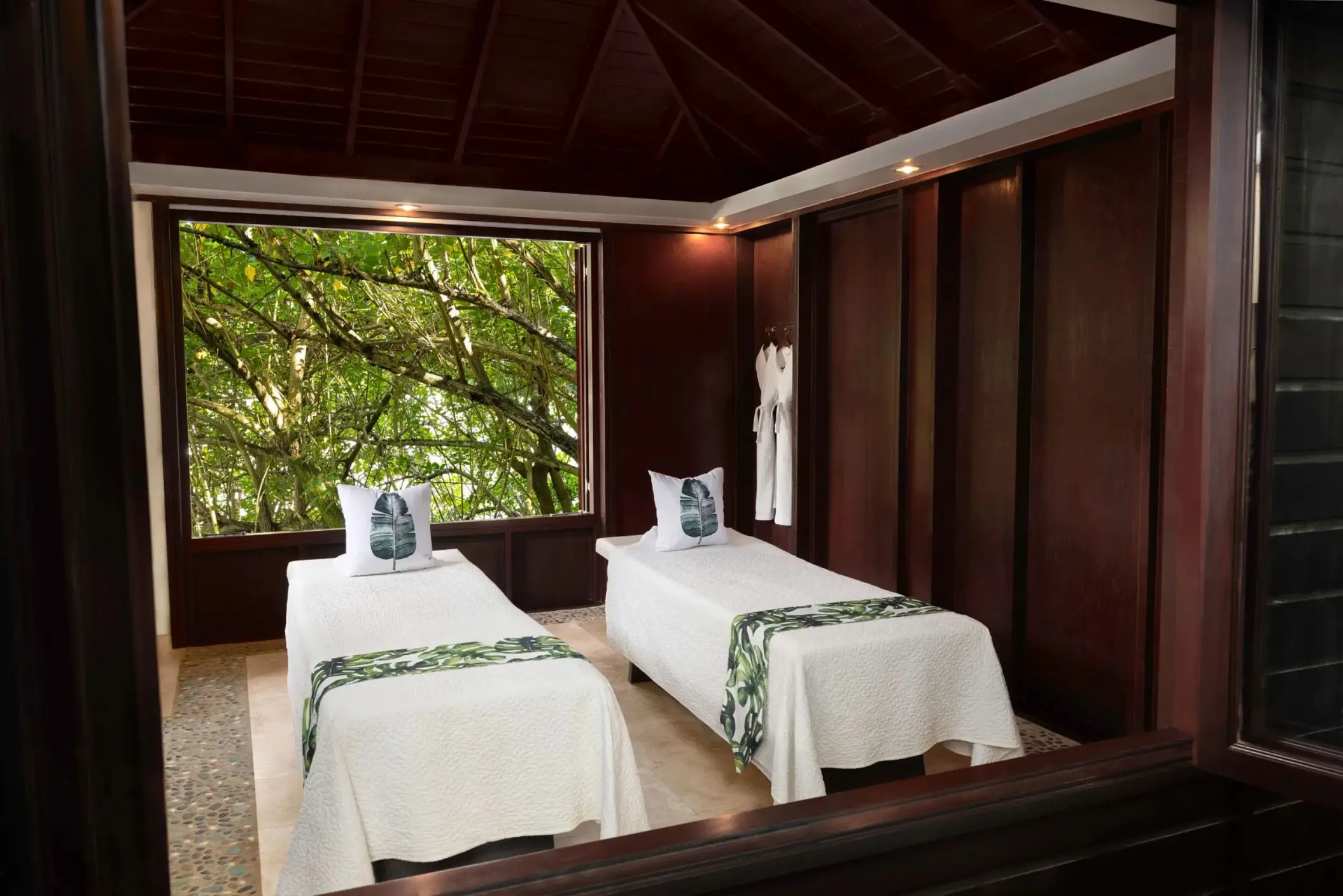 Spa treatment room with two massage beds at Zoetry Marigot Bay, Castries