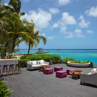 Coyaba Deck wedding reception lounge with bar and ocean views at Zoetry Montego Bay, Jamaica