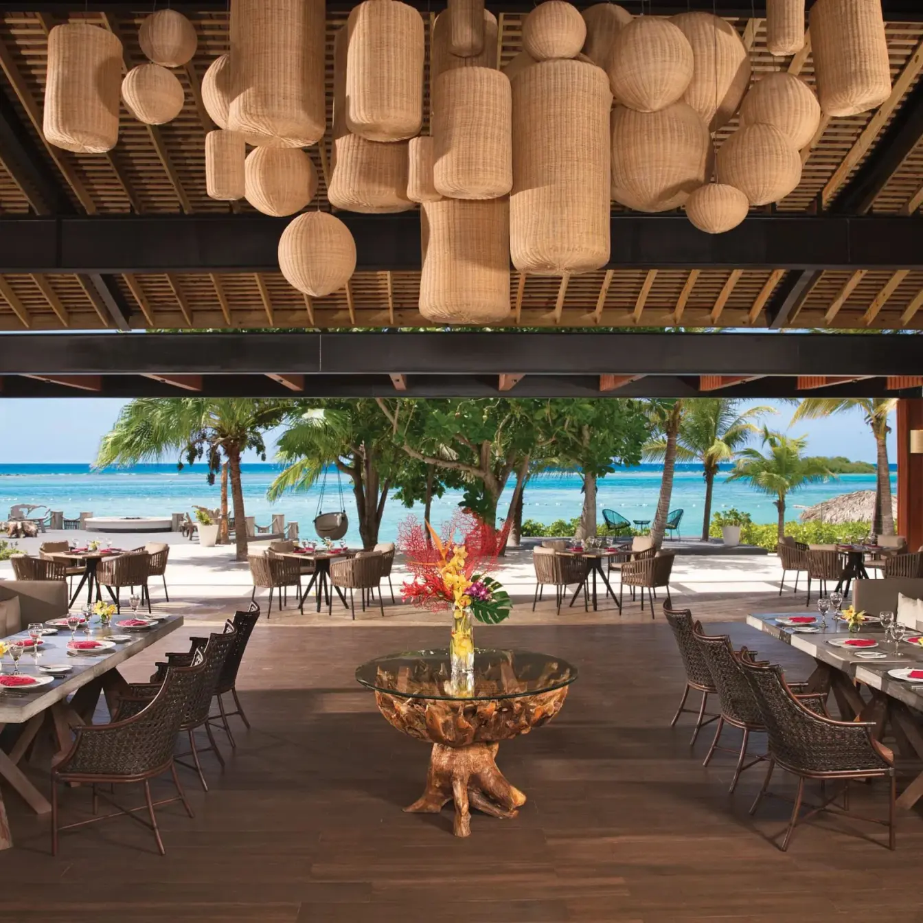 Coyaba restaurant dining area with woven lanterns at Zoetry Montego Bay, Jamaica