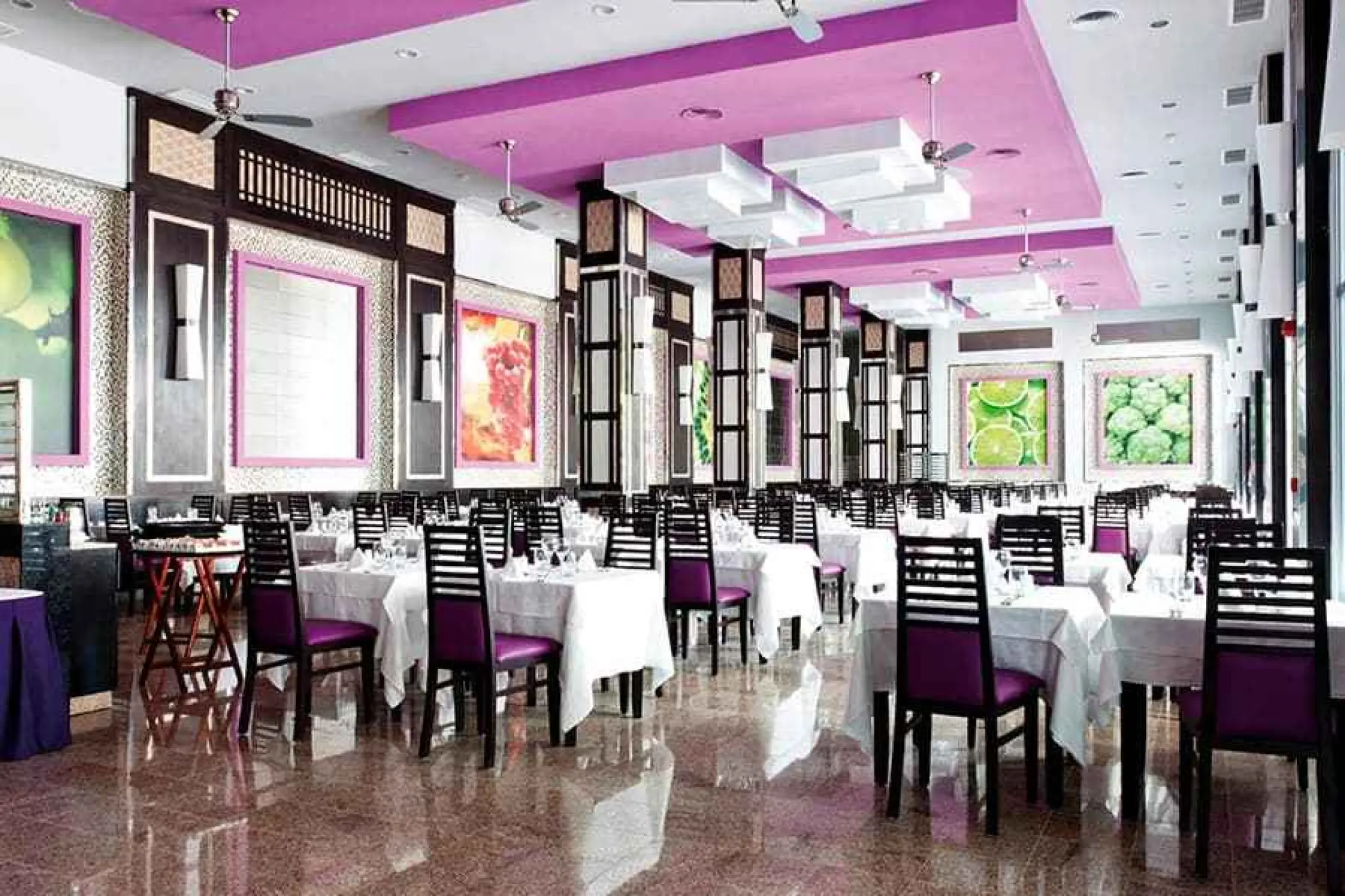 Modern restaurant dining room with purple accents at Riu Palace Mexico, Playa Del Carmen