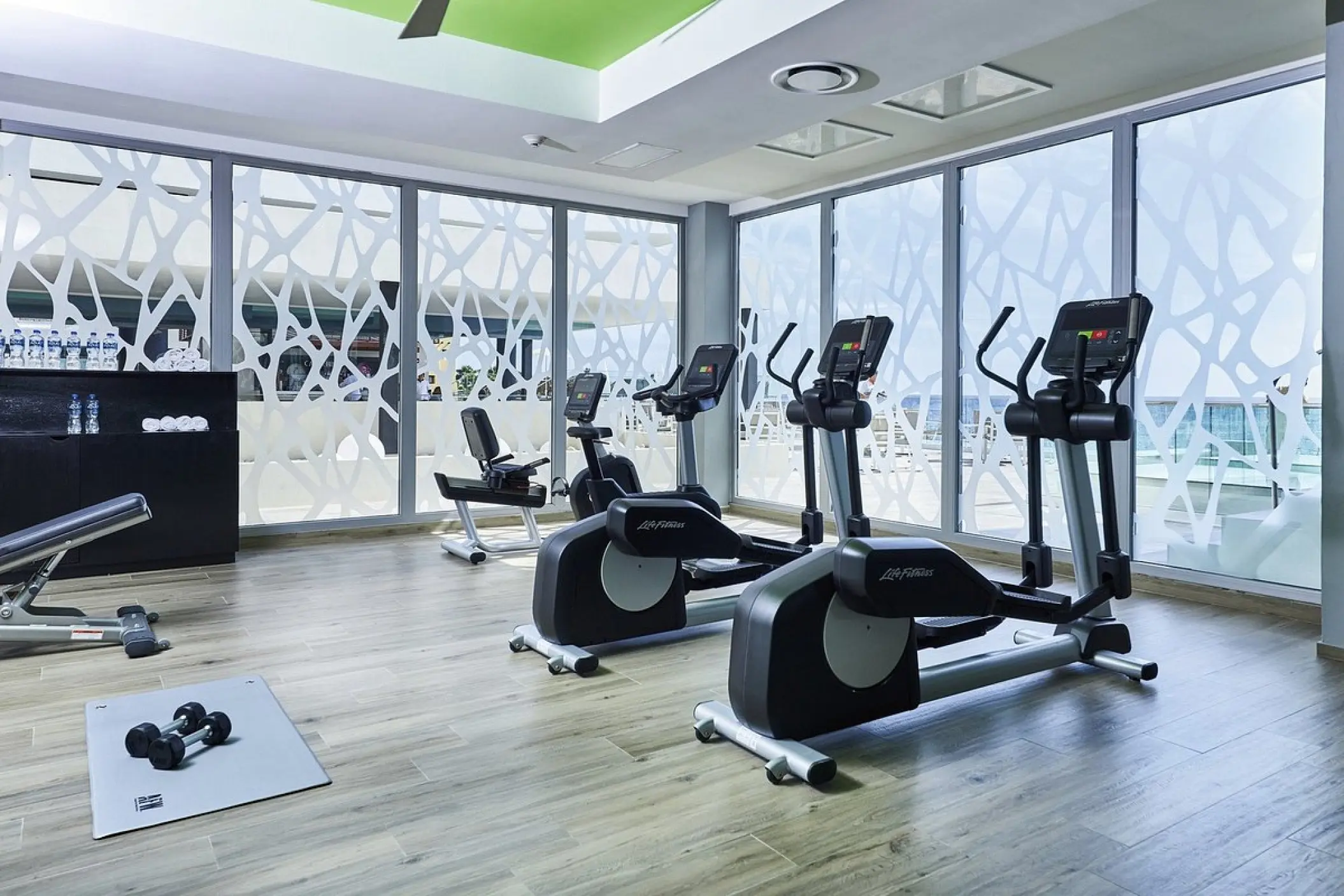Fitness center with elliptical machines and stationary bikes at Riu Palace Baja California, Cabo San Lucas