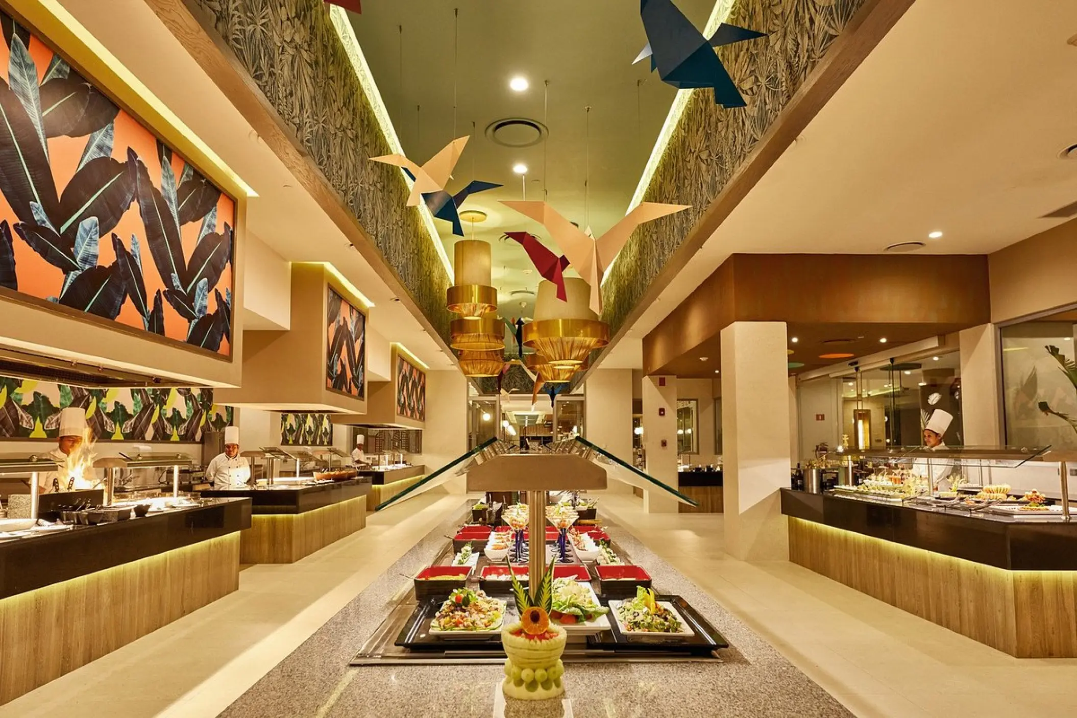 Buffet stations and modern decor at the Riu Palace Baja California main restaurant, Cabo San Lucas