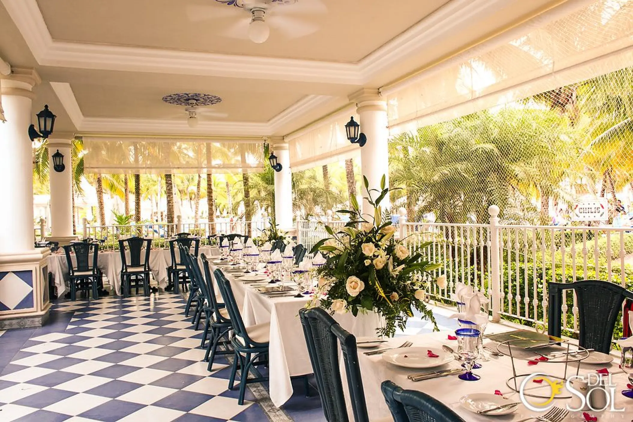 Outdoor wedding reception setup with checkered flooring at Riu Palace Costa Mujeres, Cancun