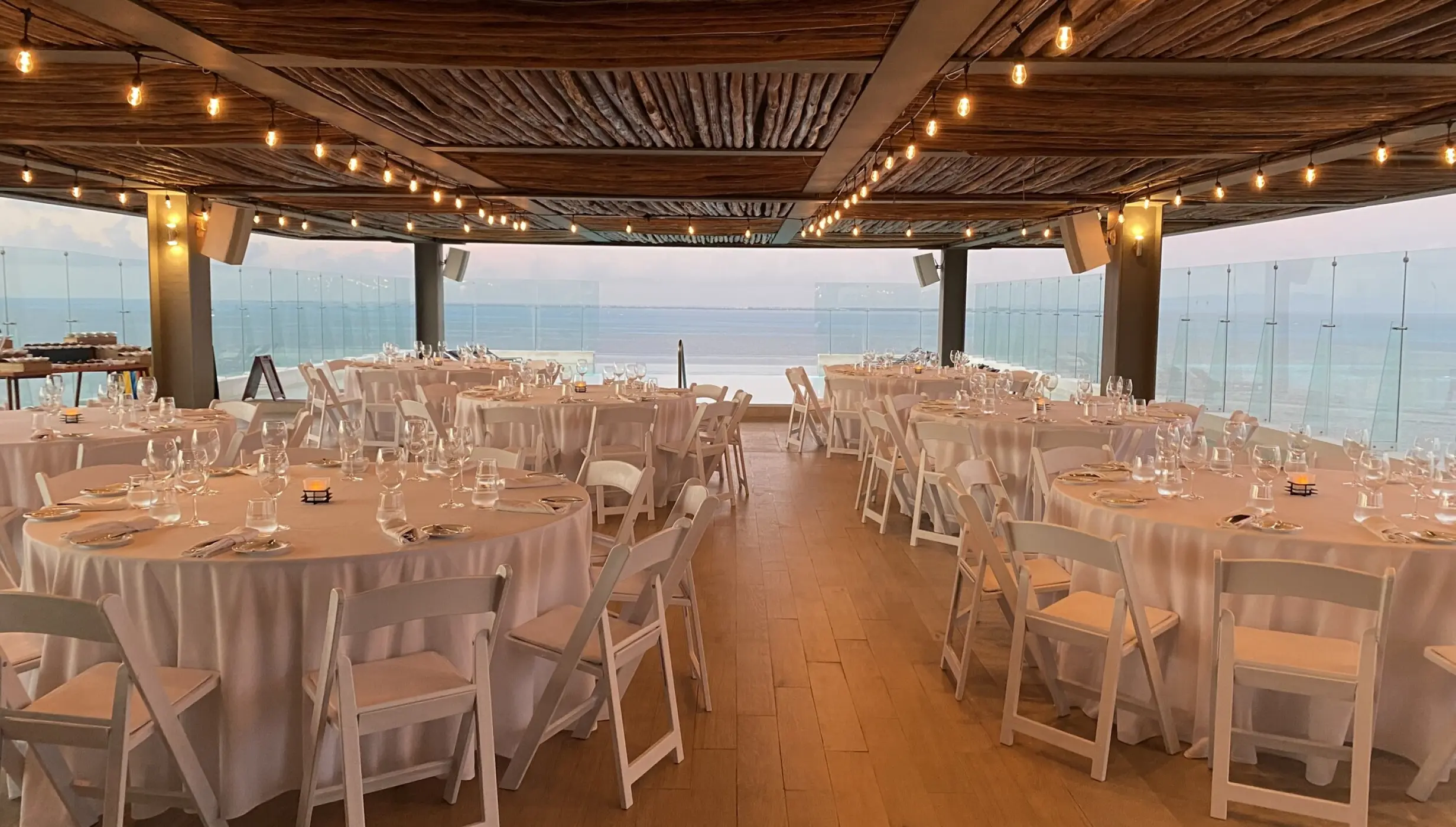 Dinner setup on Infinity Pool Rooftop Venue at Dreams Vista Cancun Golf and Spa