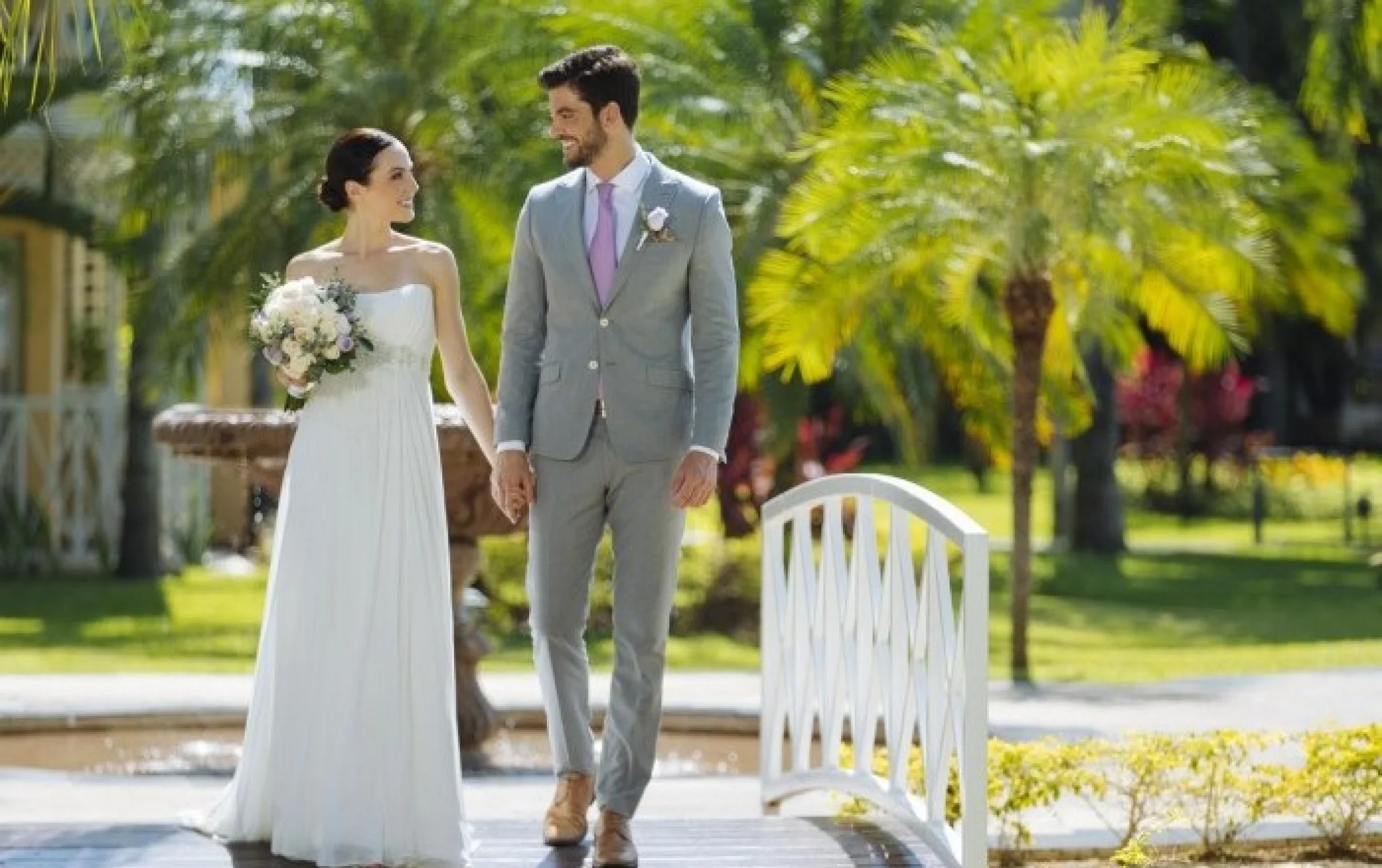 Couple walking on the terrace at Royal Hideaway Playacar Adults Only