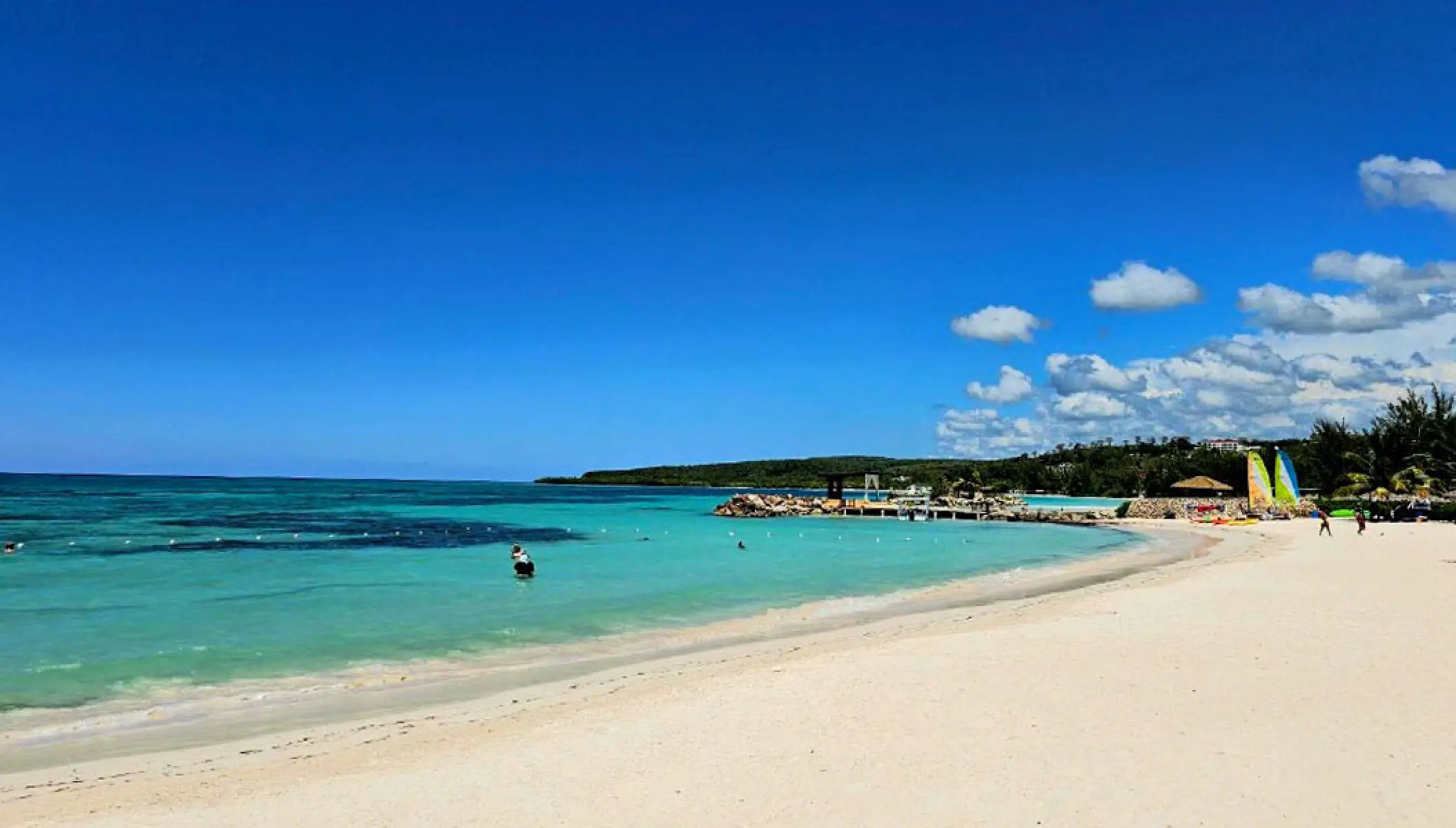 White sand beach and turquoise water at Royalton Blue Waters, Montego Bay
