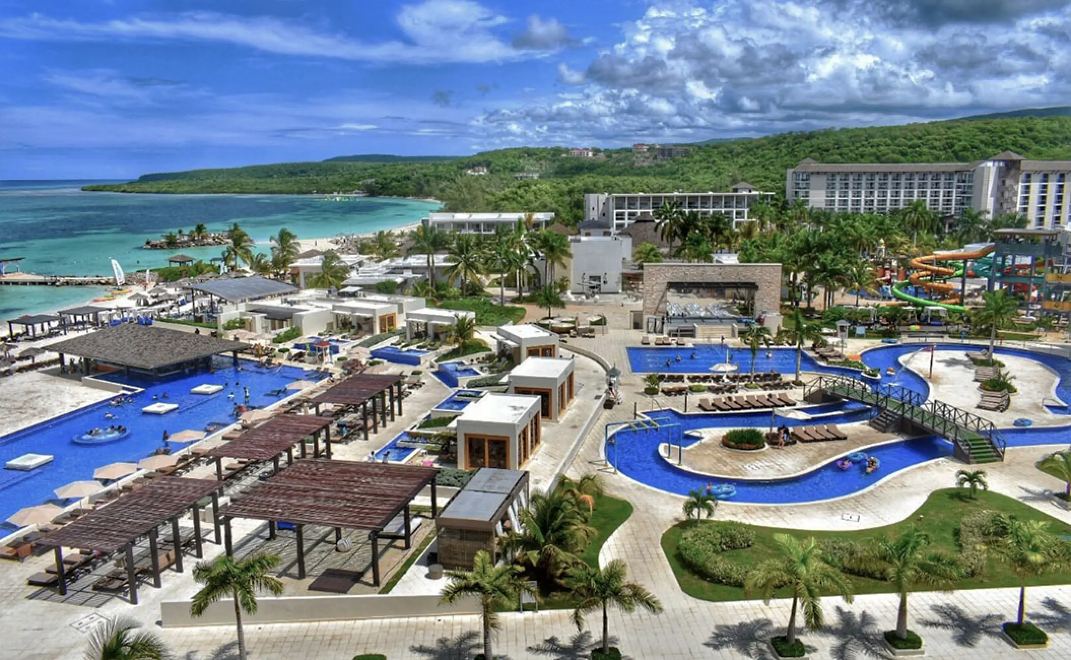Aerial view of swimming pools and lazy river at Royalton Blue Waters, Montego Bay