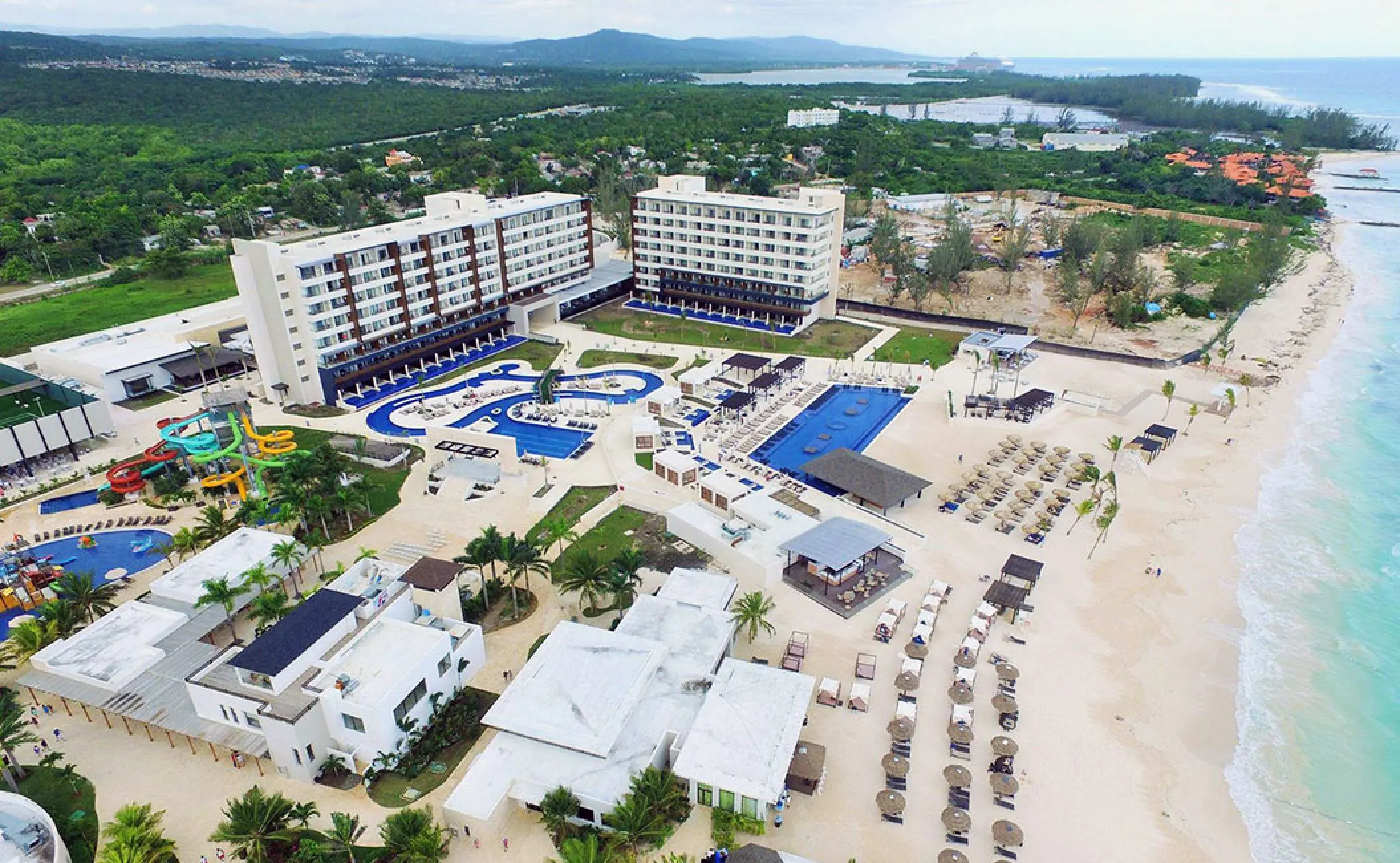Aerial view of Royalton Blue Waters pools and white sand beach, Montego Bay