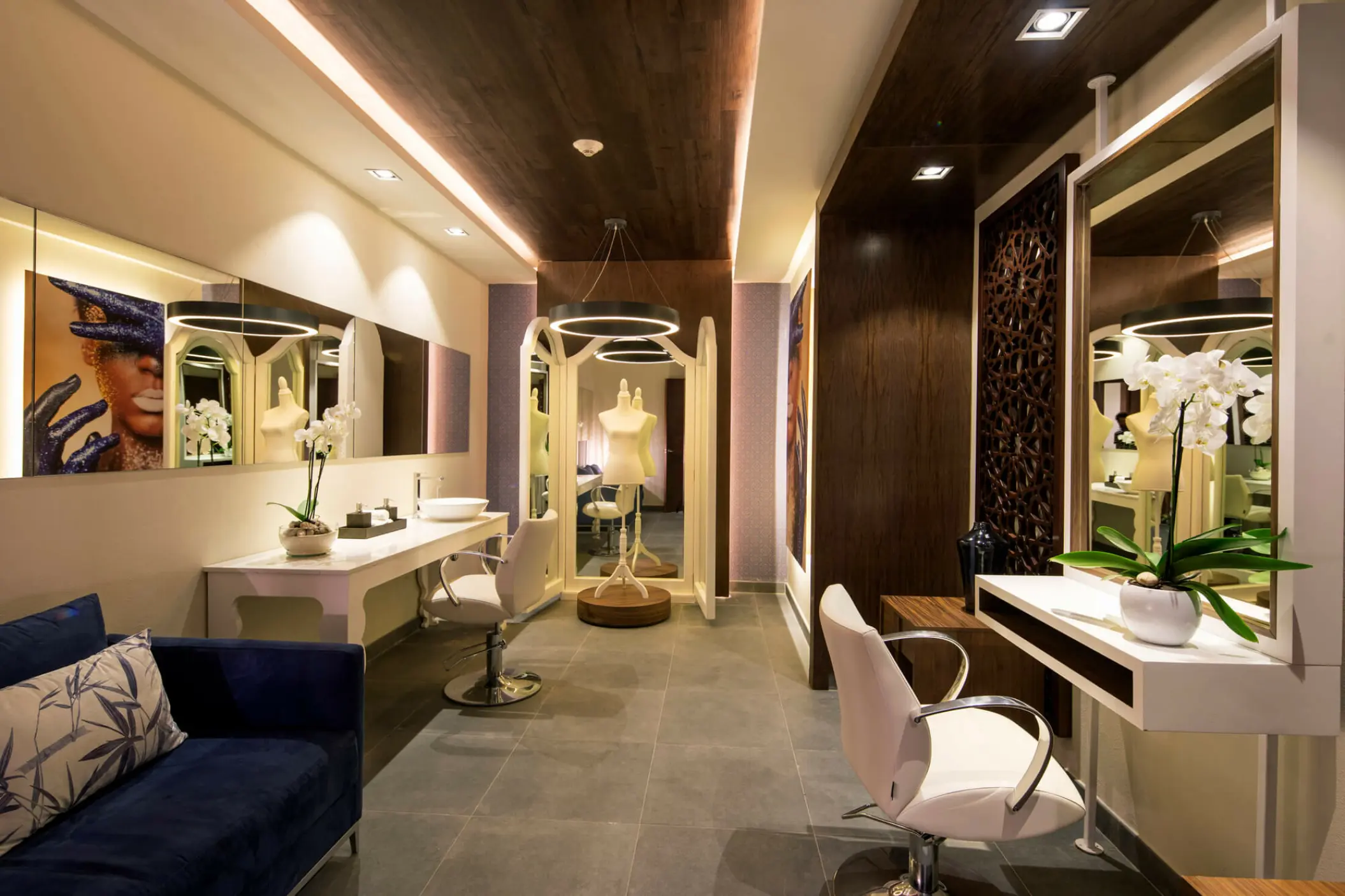 Bridal suite with salon chairs, vanity mirrors, and a dressing area at Royalton CHIC Cancun, Cancun