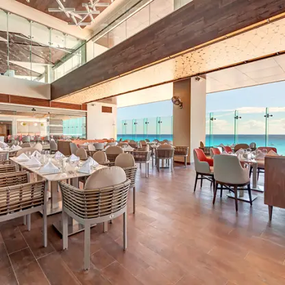 Gourmet Marche dining area with turquoise ocean views at Royalton CHIC Cancun