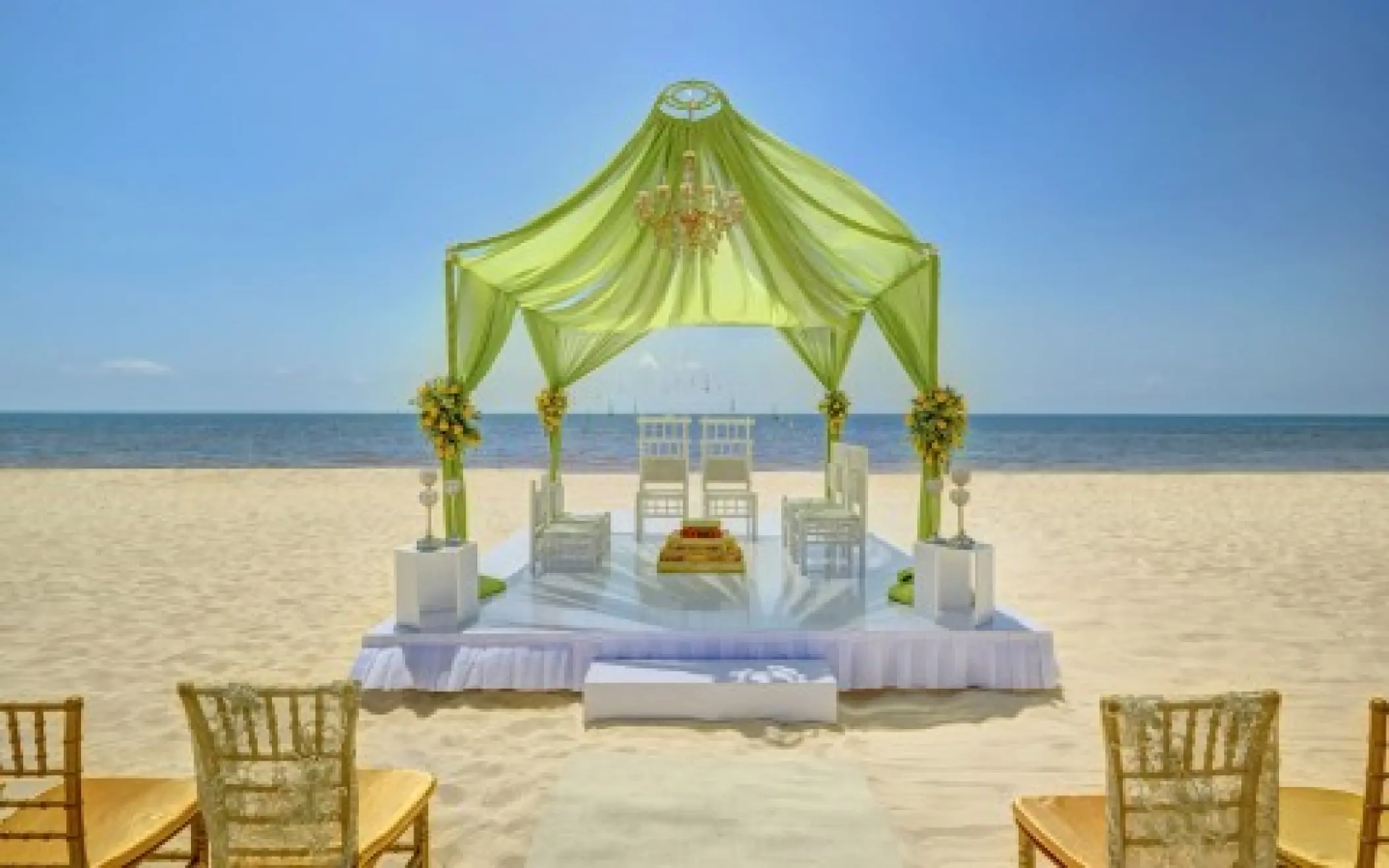 Mandap setup for a South Asian wedding ceremony at Royalton Riviera Cancun