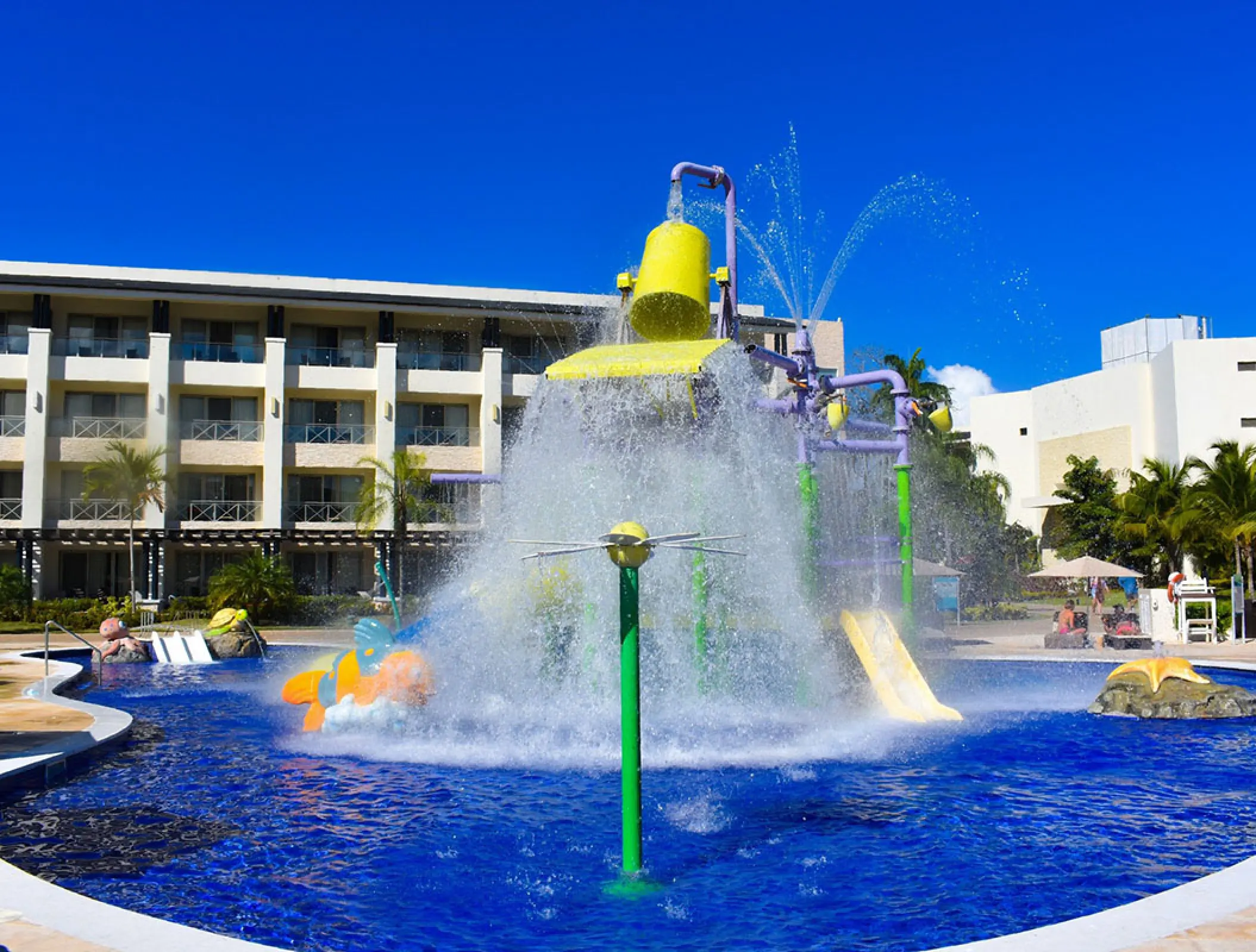 Kids pool with water bucket splash and slides at Royalton Negril, Negril