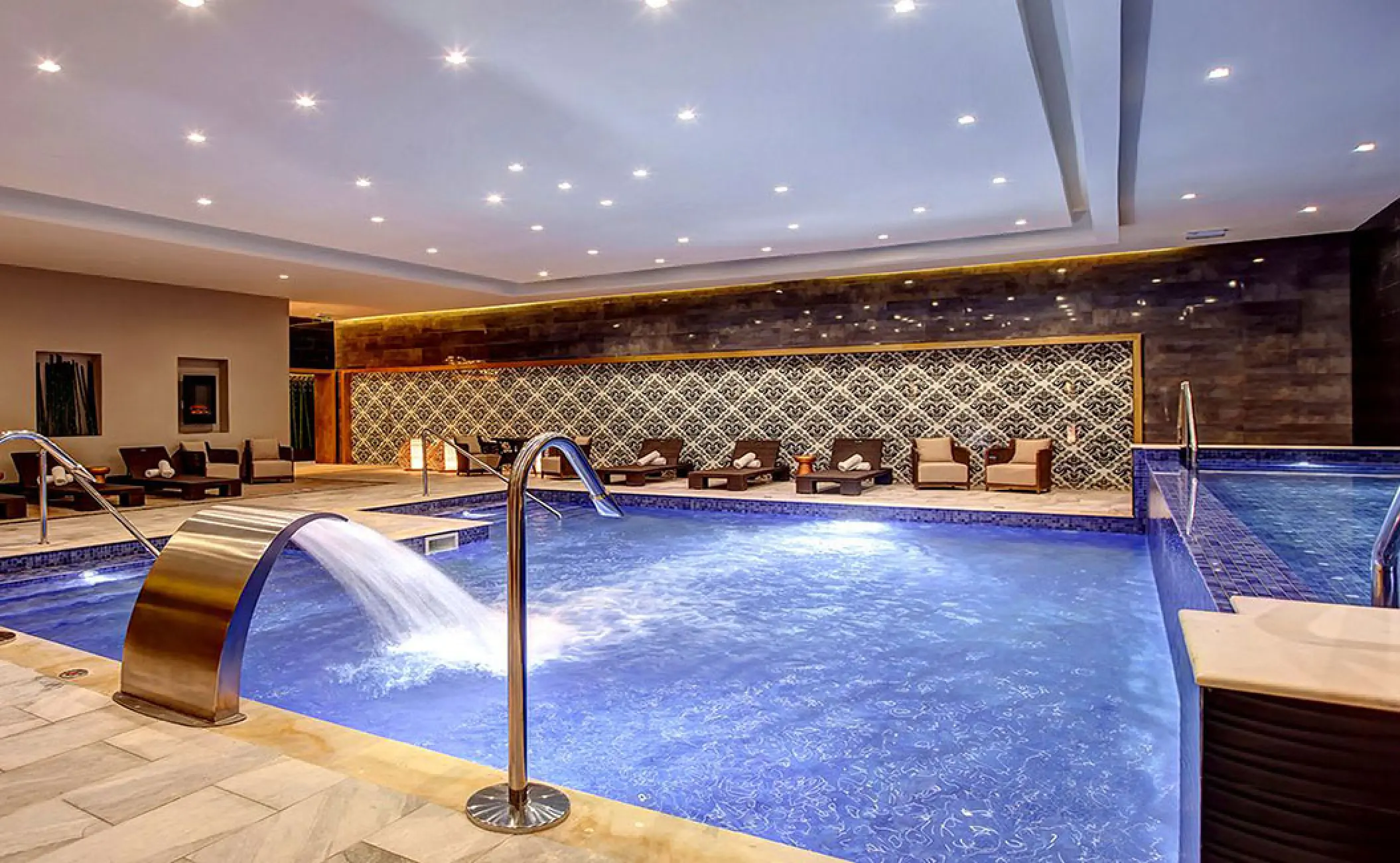 Indoor hydrotherapy pool with swan-neck water jets at Royalton Negril, Jamaica