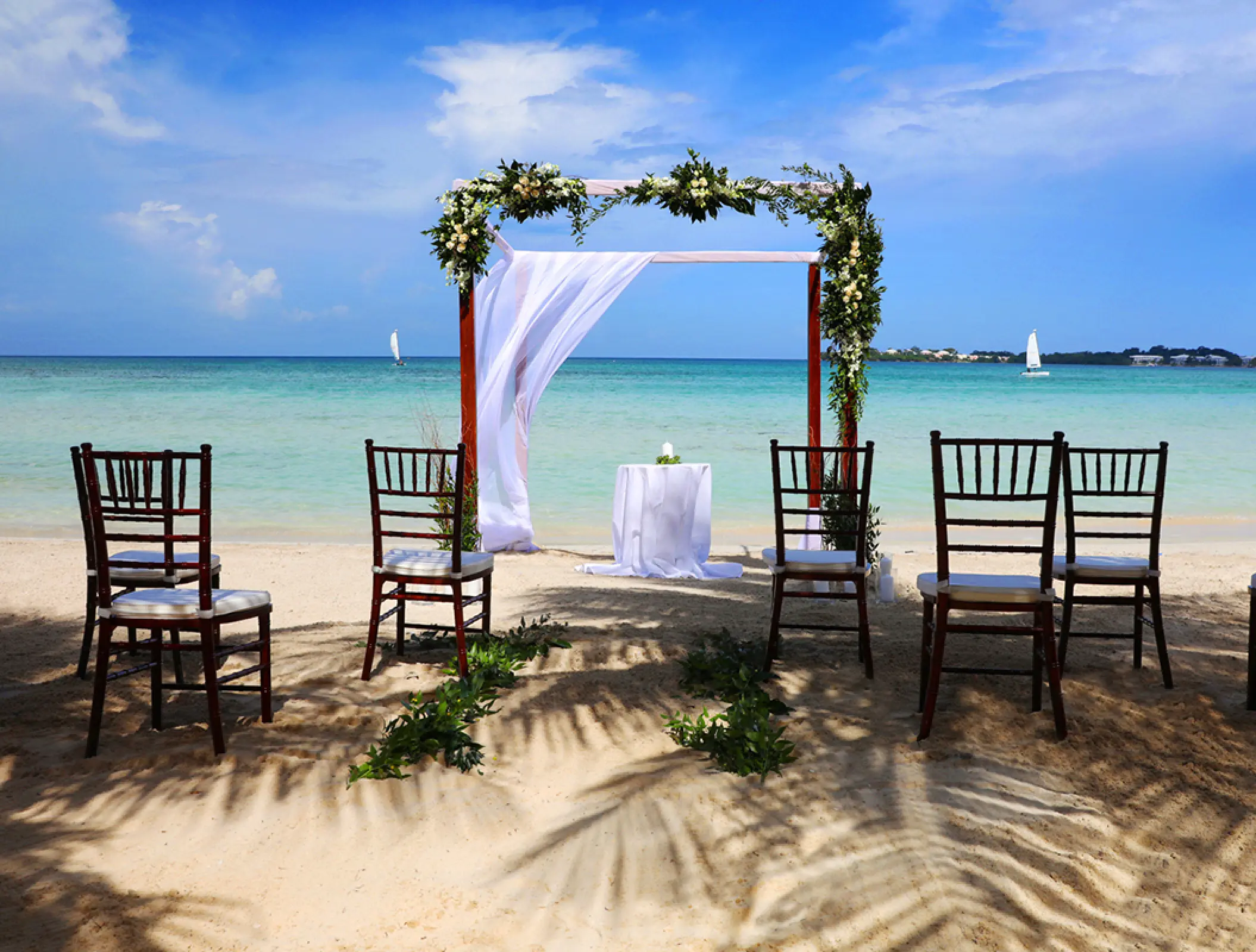 Beachfront wedding ceremony setup at Royalton Hideaway Negril, Jamaica