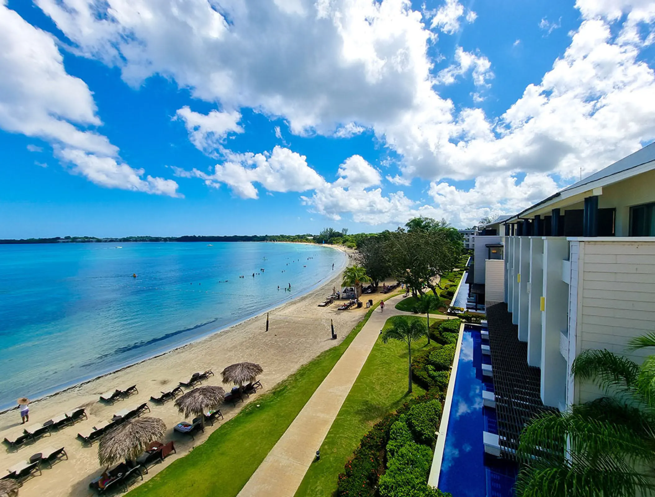 Royalton Negril beachfront buildings and white sand bay, Negril