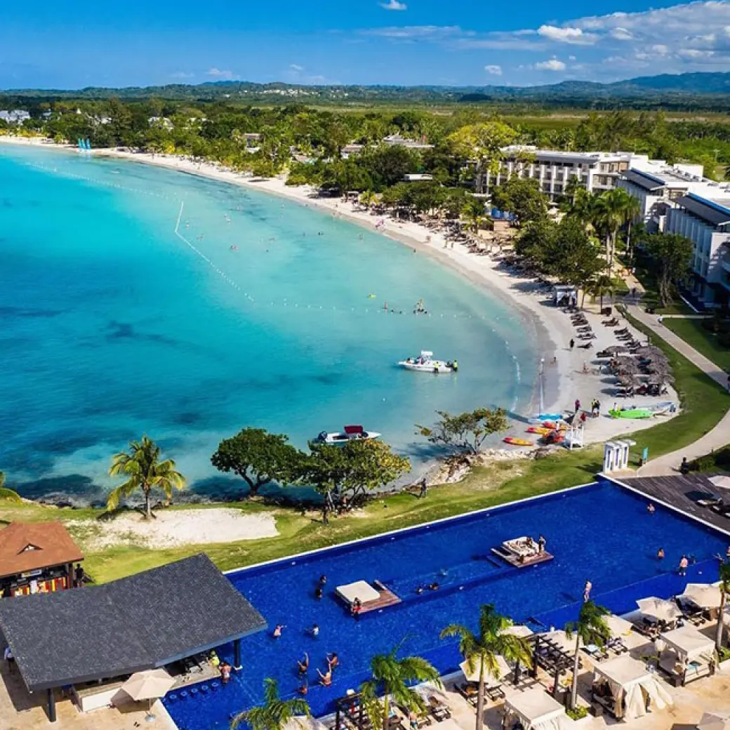 Aerial view of Royalton Negril showing the beachfront, pool, and turquoise bay, Negril