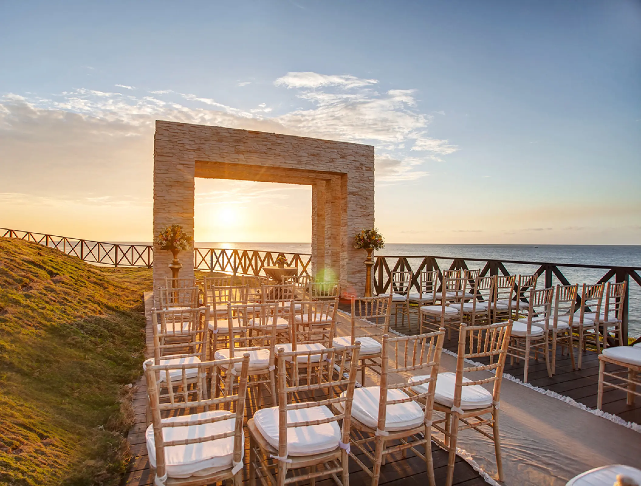 Sunset oceanfront wedding ceremony at the Ocean Point Gazebo in Royalton Negril, Negril