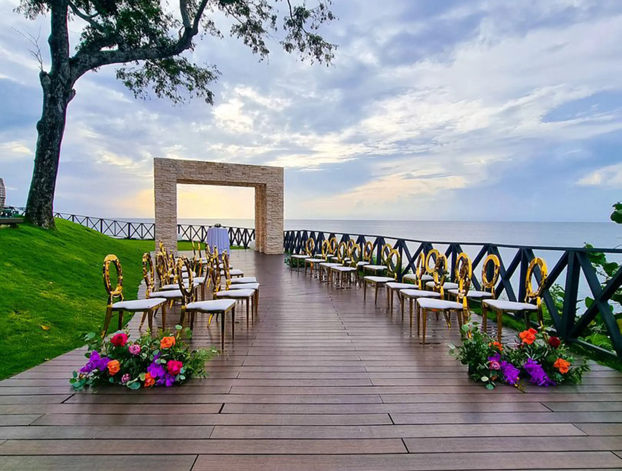 Ocean Point gazebo wedding ceremony setup on a wooden deck at Royalton Negril, Negril