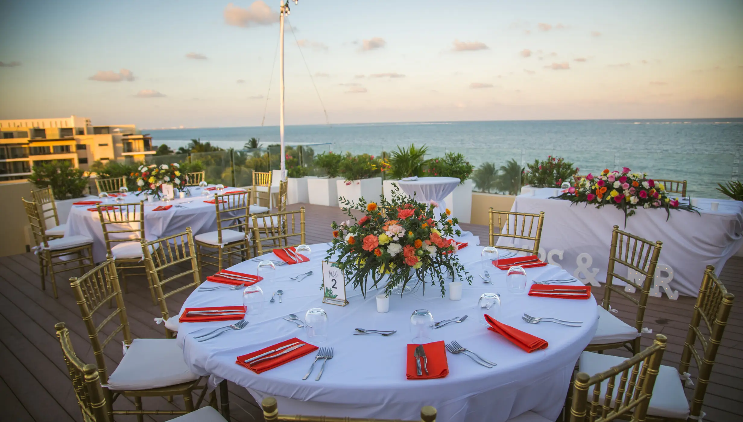 Dinner reception decor on the sky wedding at Royalton Riviera Cancun