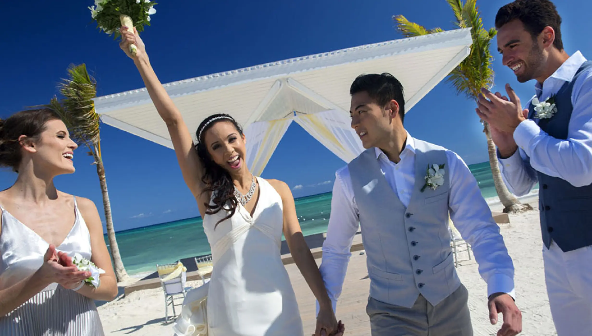 Newlyweds celebrating at Royalton Splash Riviera Cancun