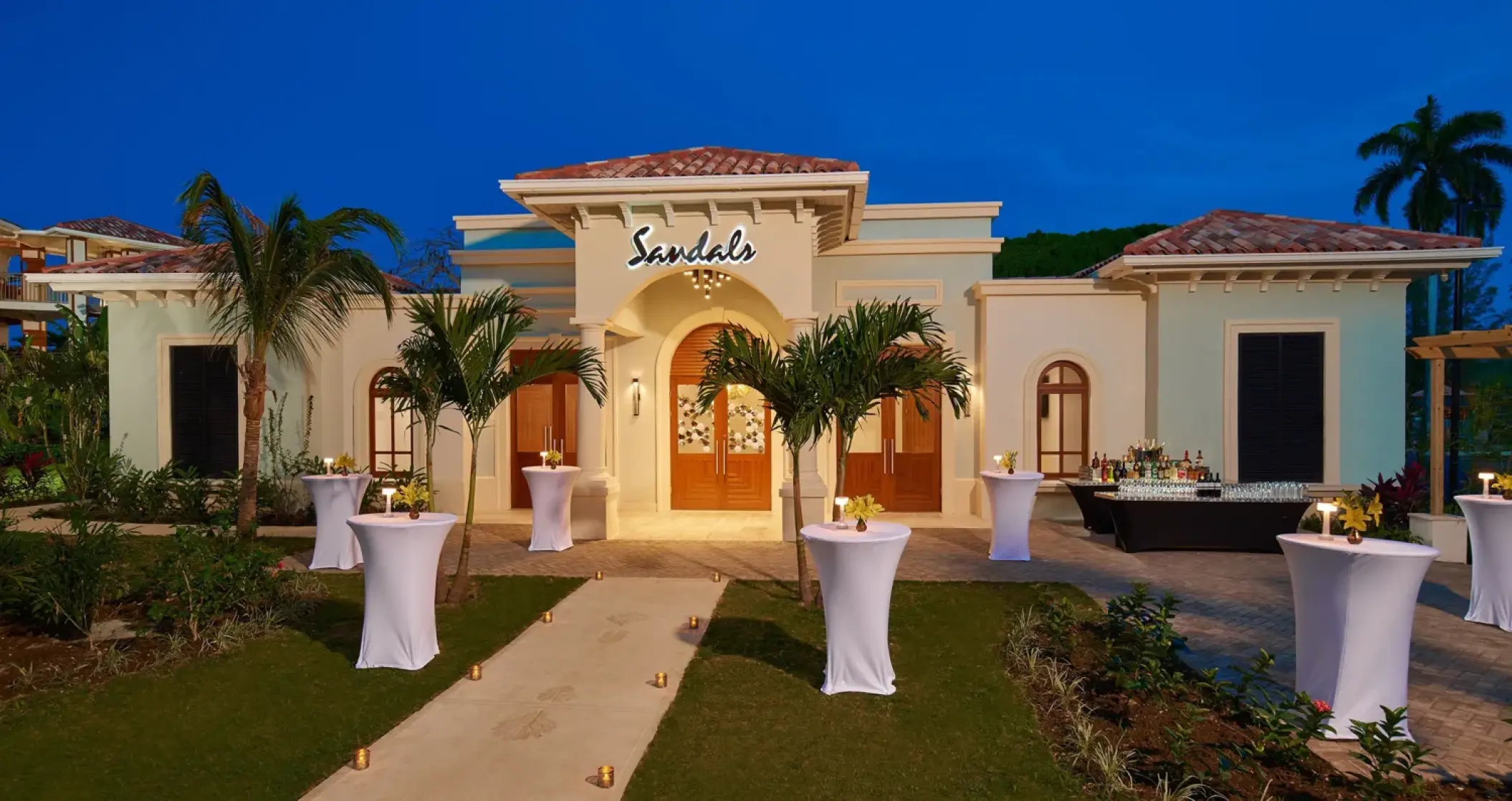 Evening wedding reception setup at Sandals Montego Bay, Montego Bay