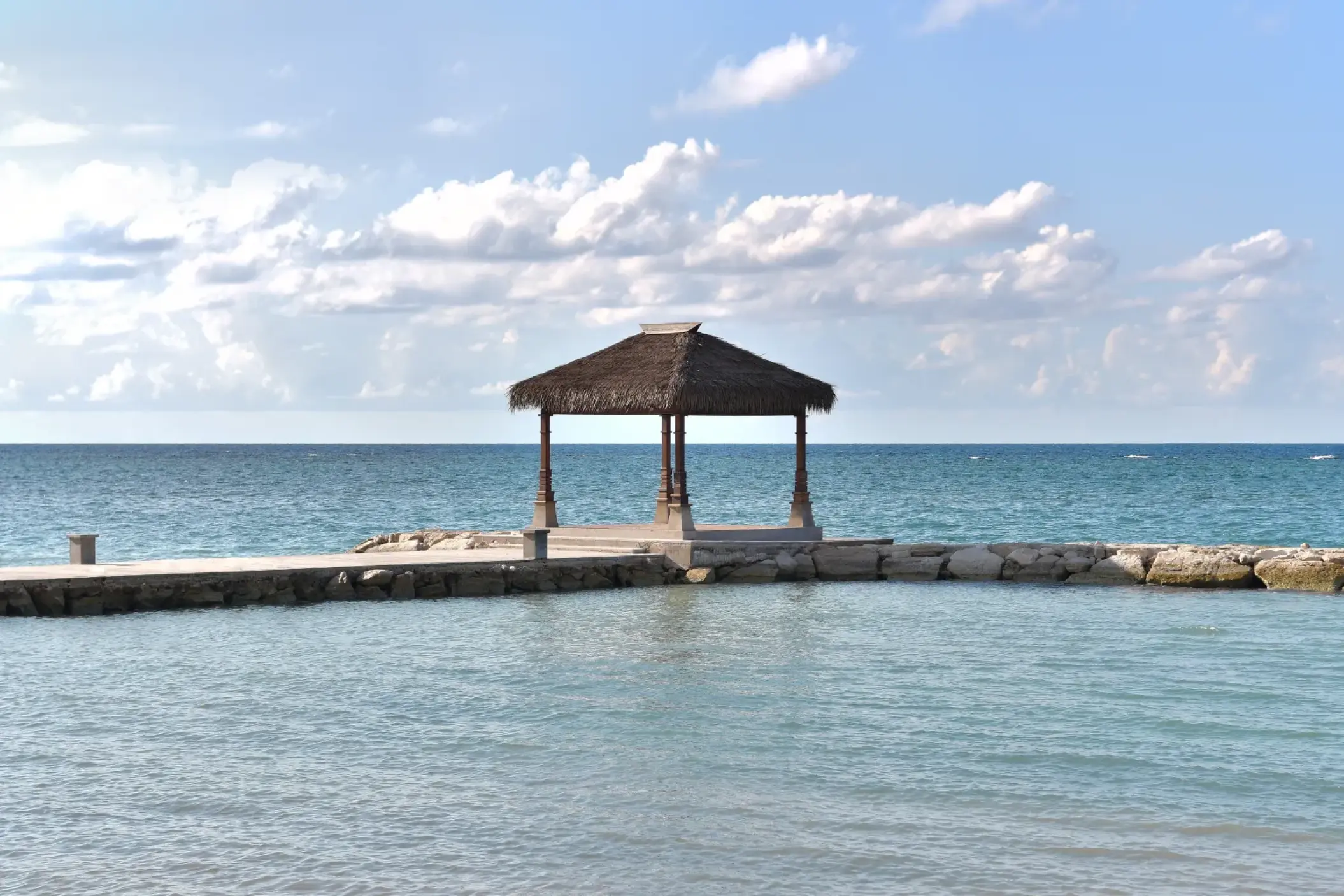 Overwater gazebo wedding ceremony venue at Sandals Montego Bay, Jamaica