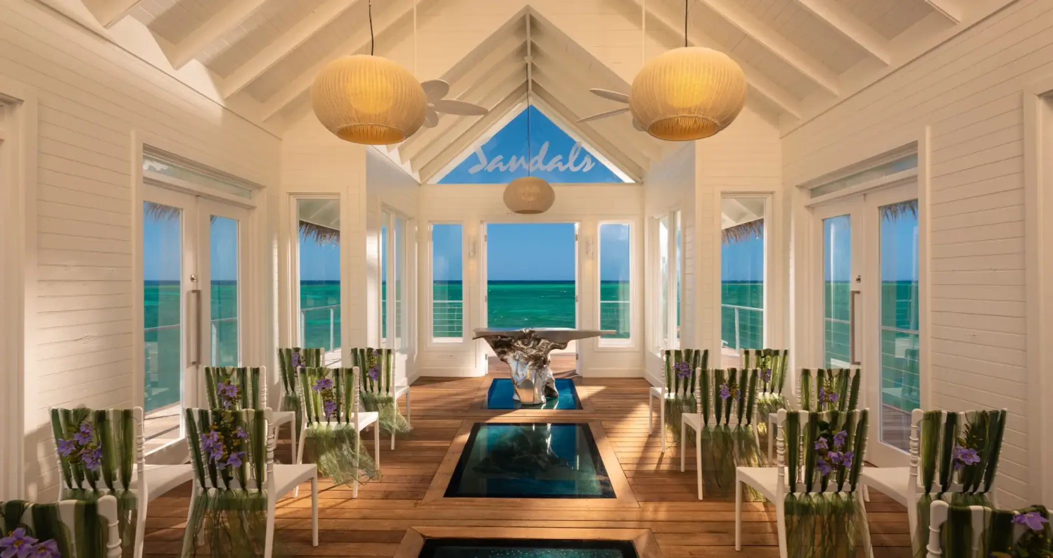 Overwater wedding chapel with glass floor panels at Sandals Montego Bay, Montego Bay