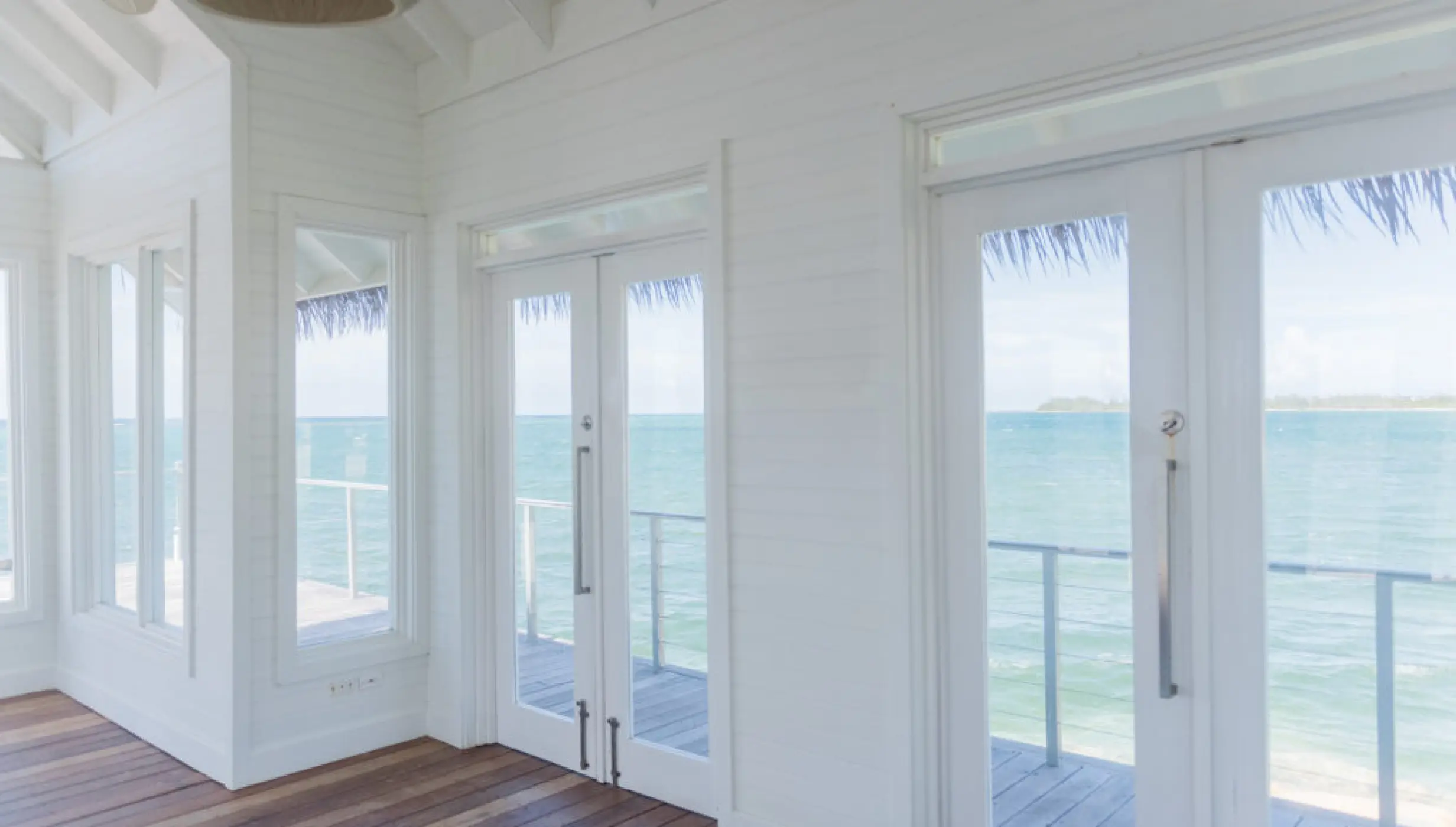 Interior of the white overwater wedding chapel at Sandals Montego Bay