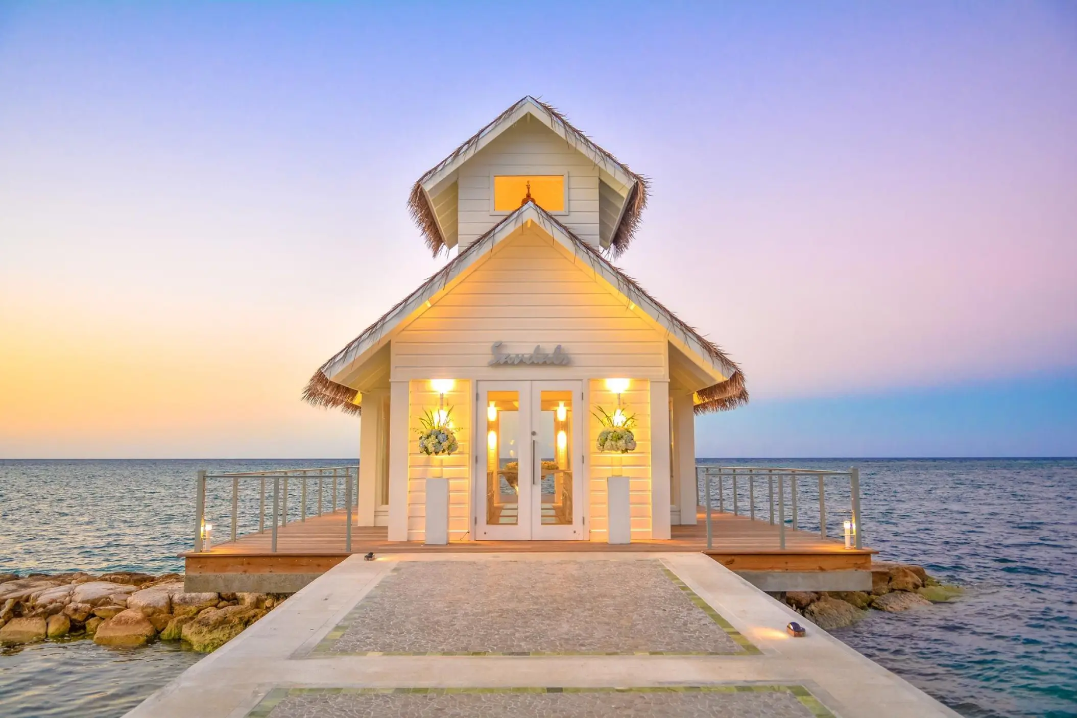 Over-the-water wedding chapel at Sandals Montego Bay at sunset, Montego Bay