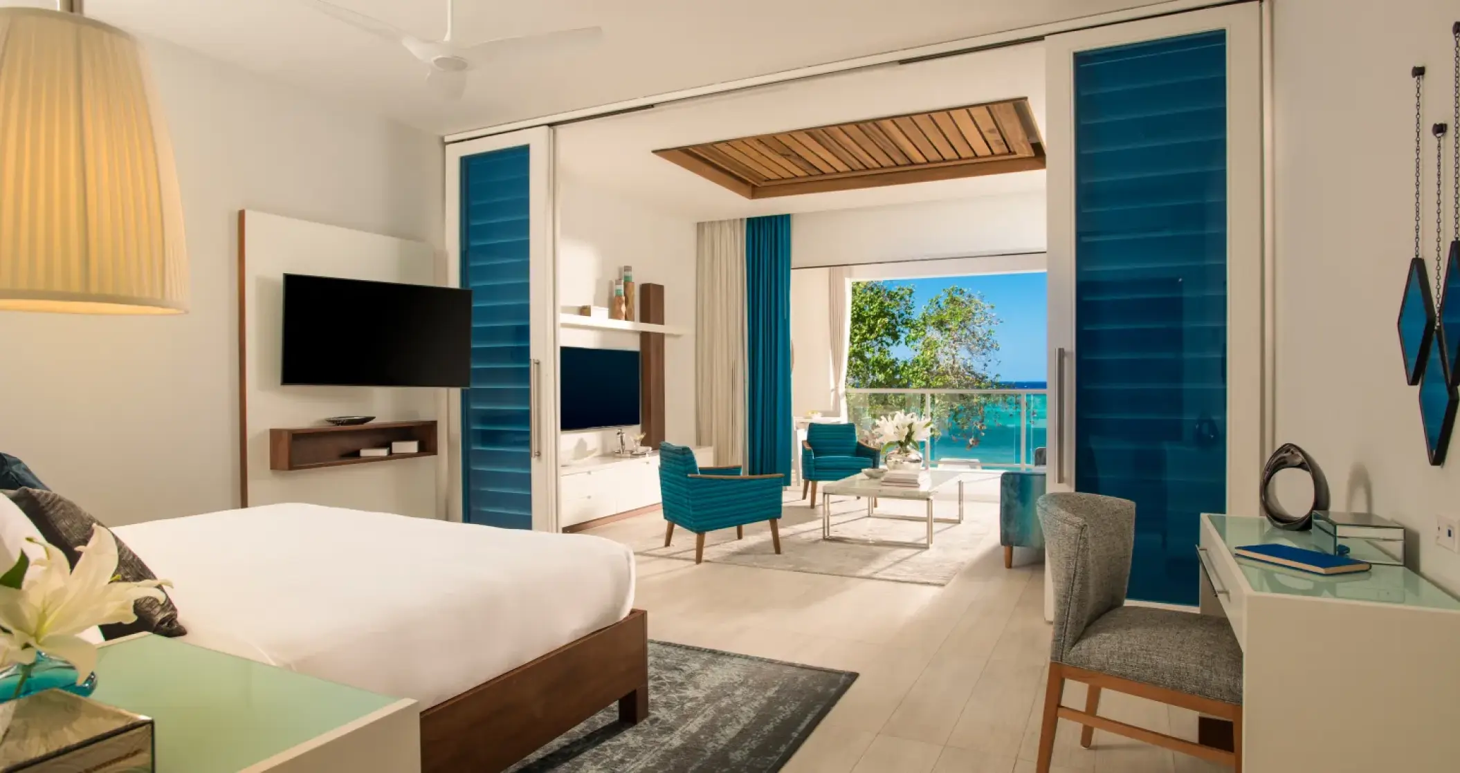 Modern oceanfront suite with private balcony at Sandals Montego Bay