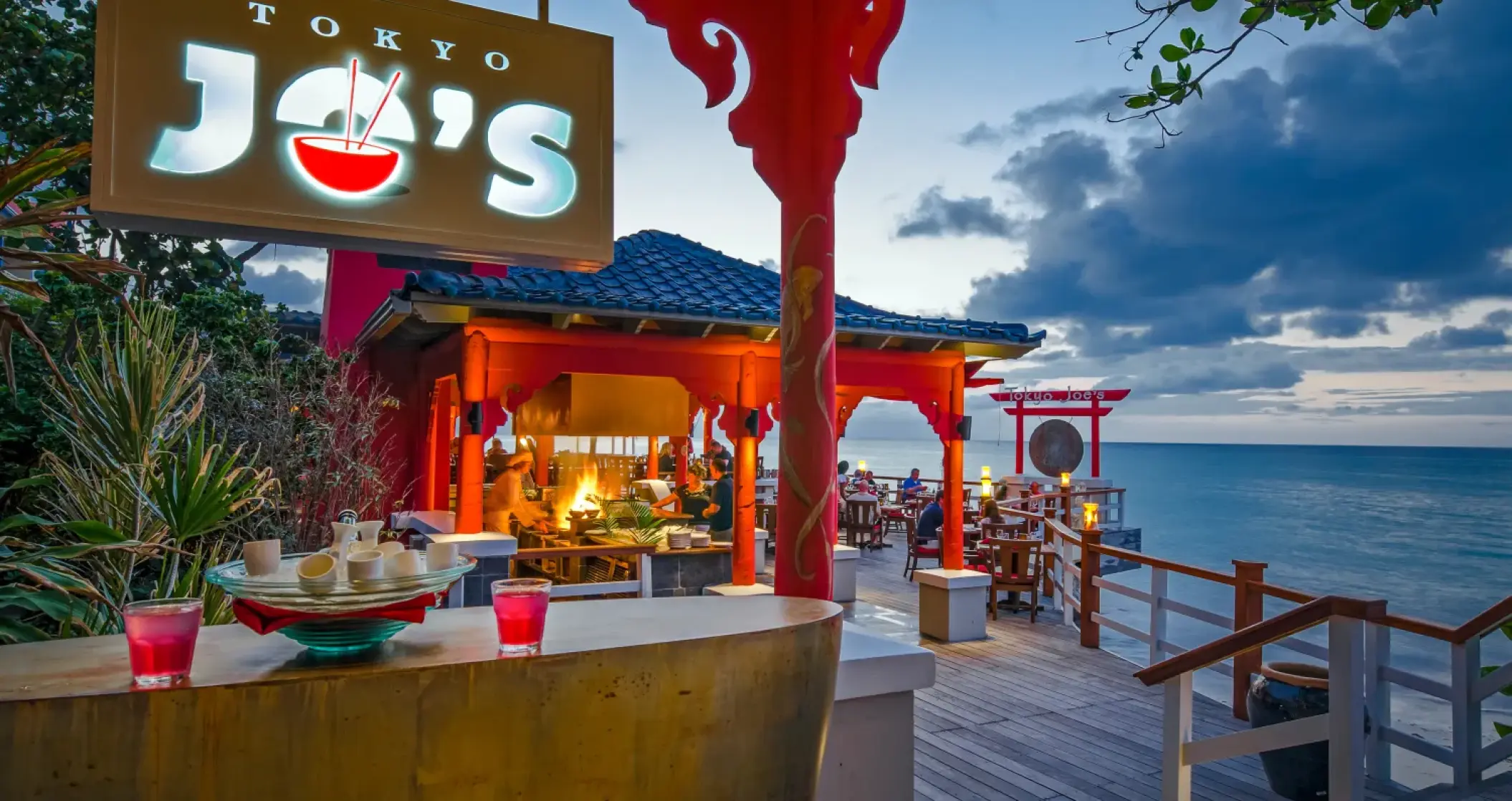 Outdoor Tokyo Jo's restaurant at Sandals Montego Bay overlooking the Caribbean sea