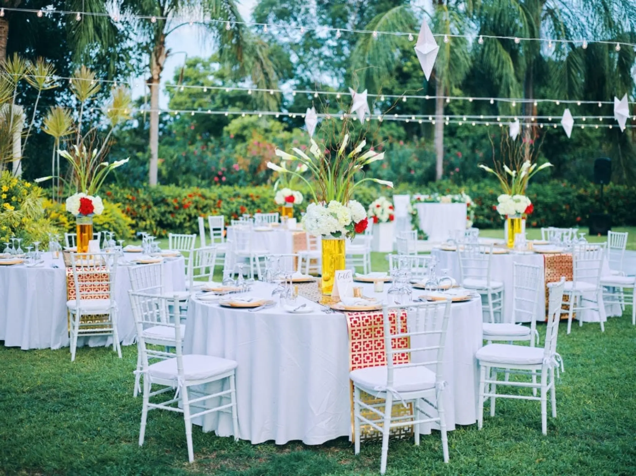 Outdoor wedding reception in the European Garden at Sandals Ochi, Ocho Rios