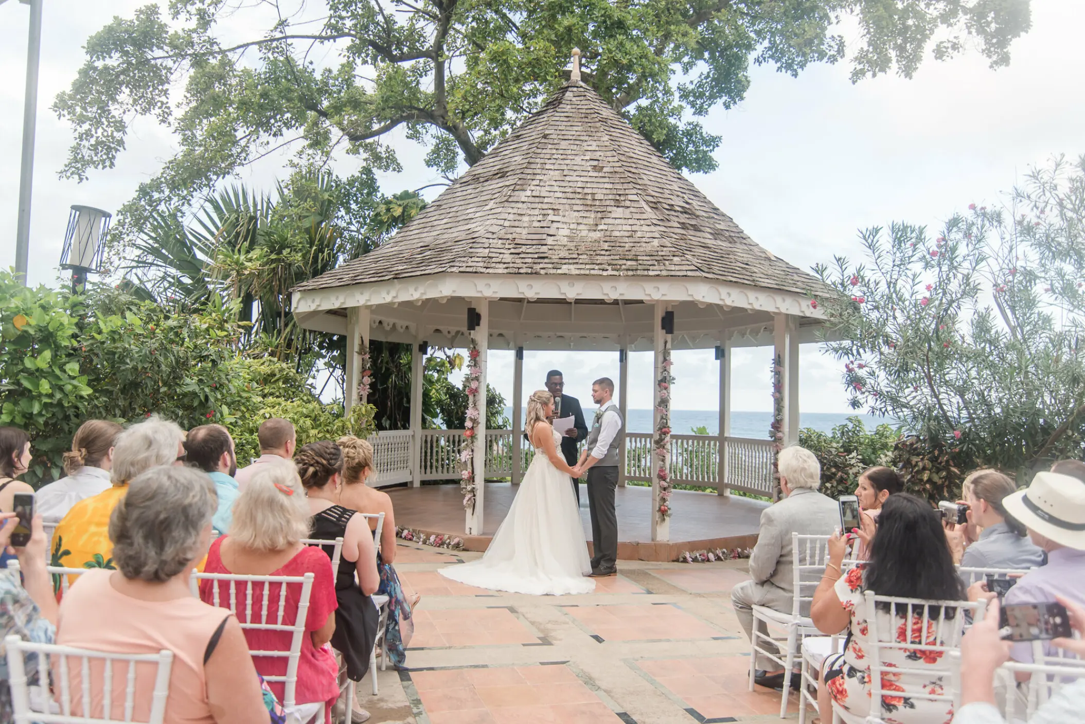 Wedding ceremony in an oceanfront gazebo at Sandals Ochi, Ocho Rios