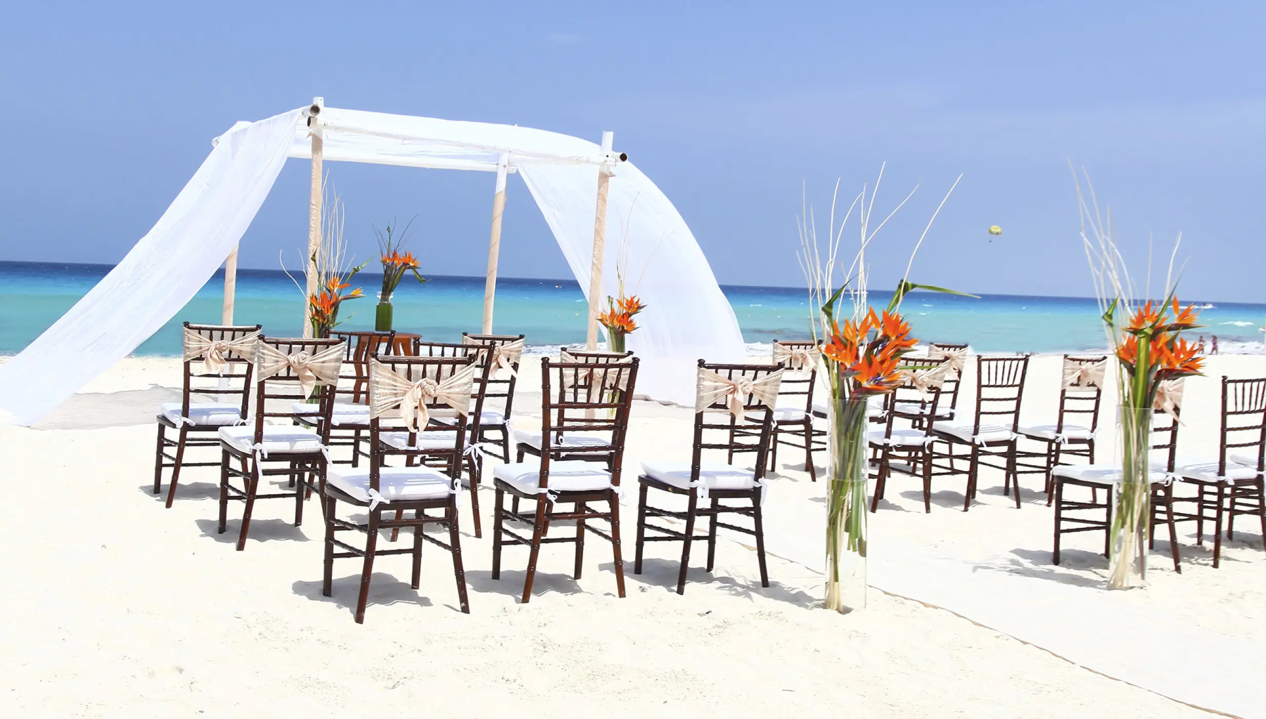 Ceremony decor on the beach wedding venue at Sandos Cancun